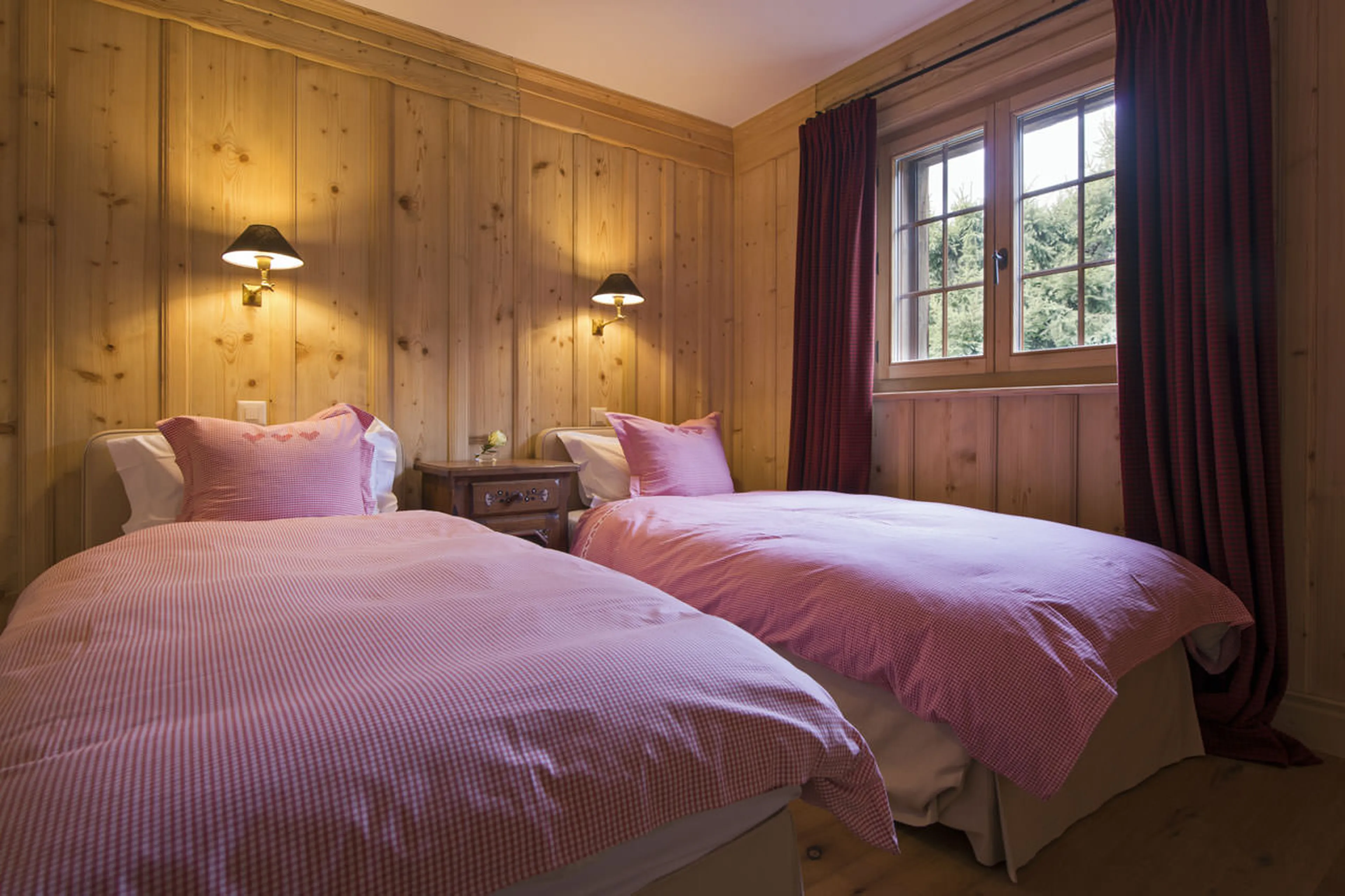Twin bedroom at Penthouse Deux Riviers in Verbier
