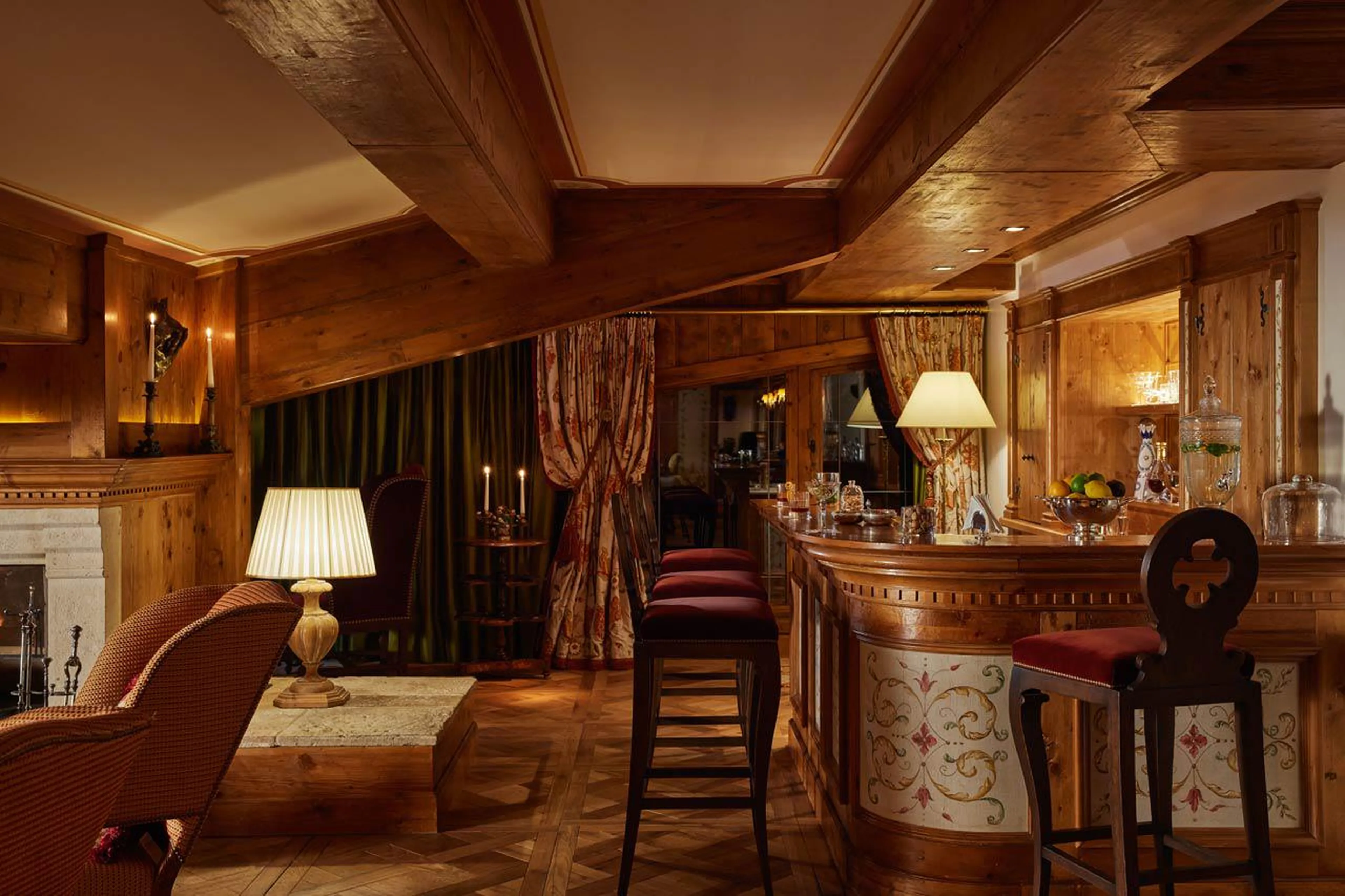 Living room with fireplace and private bar in Penthouse Les Airelles in Courchevel 1850