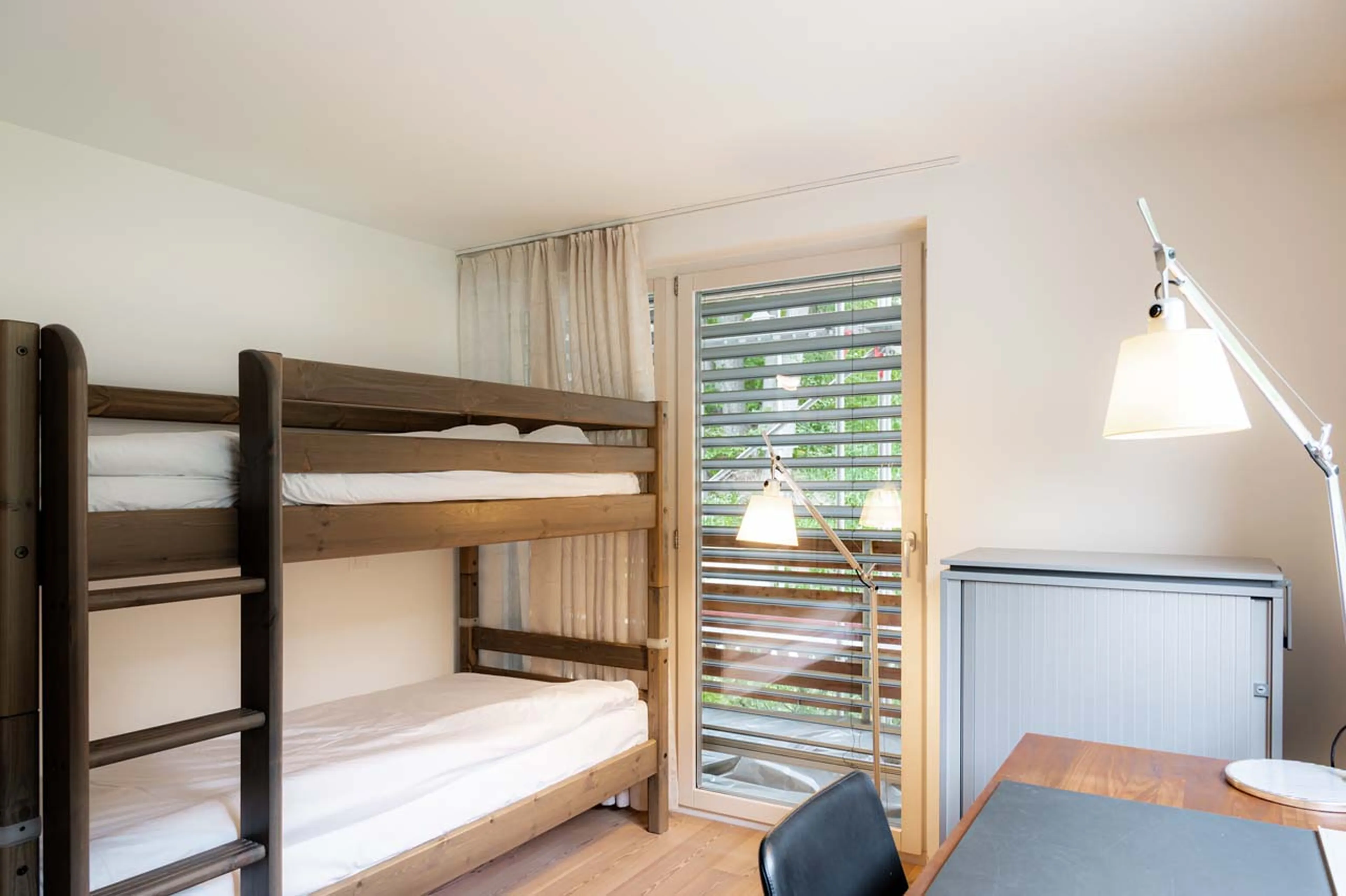 Bedroom two at Parrot Penthouse in Zermatt