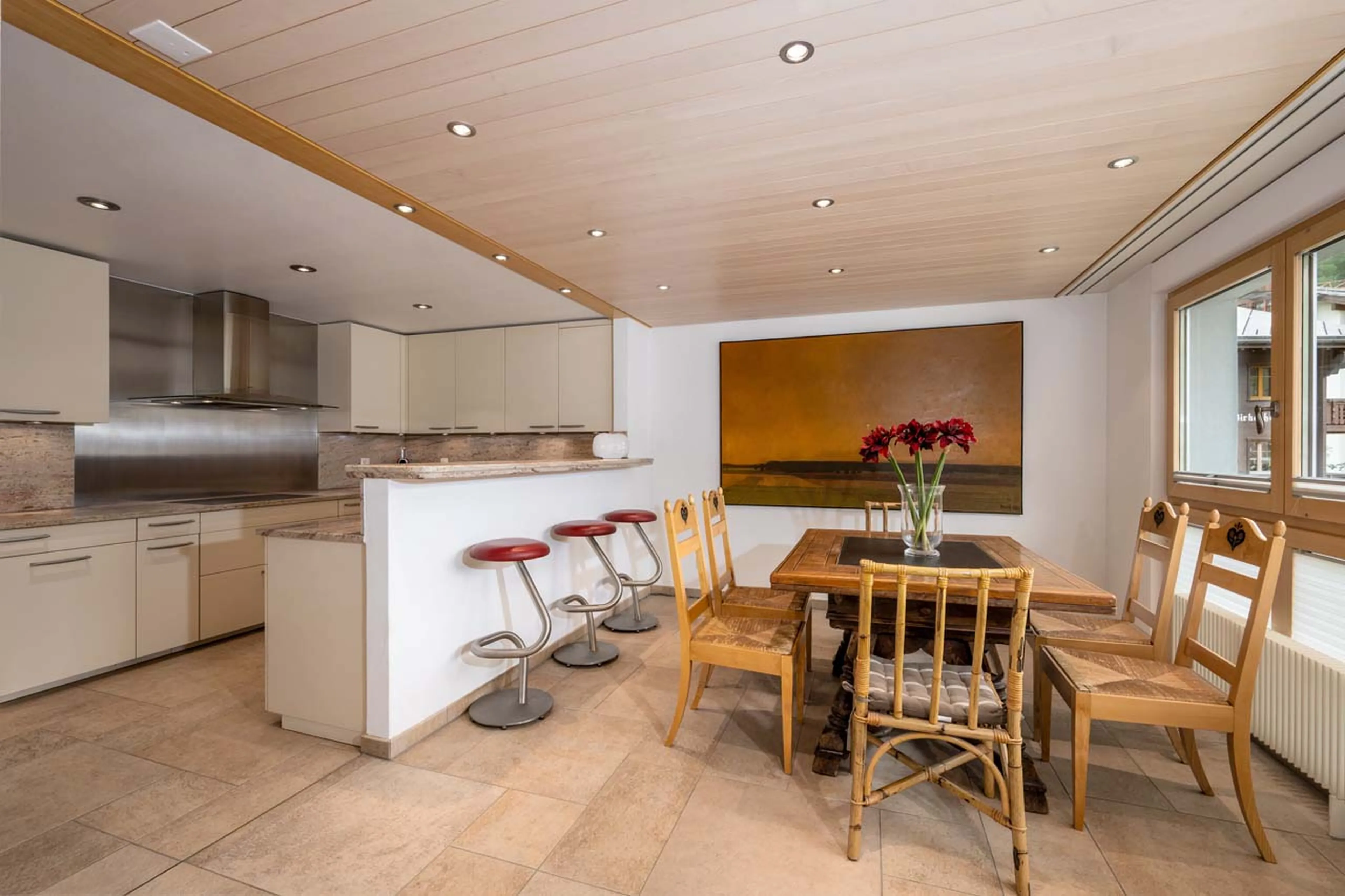Kitchen and dining area at Penthouse Tiara in Zermatt