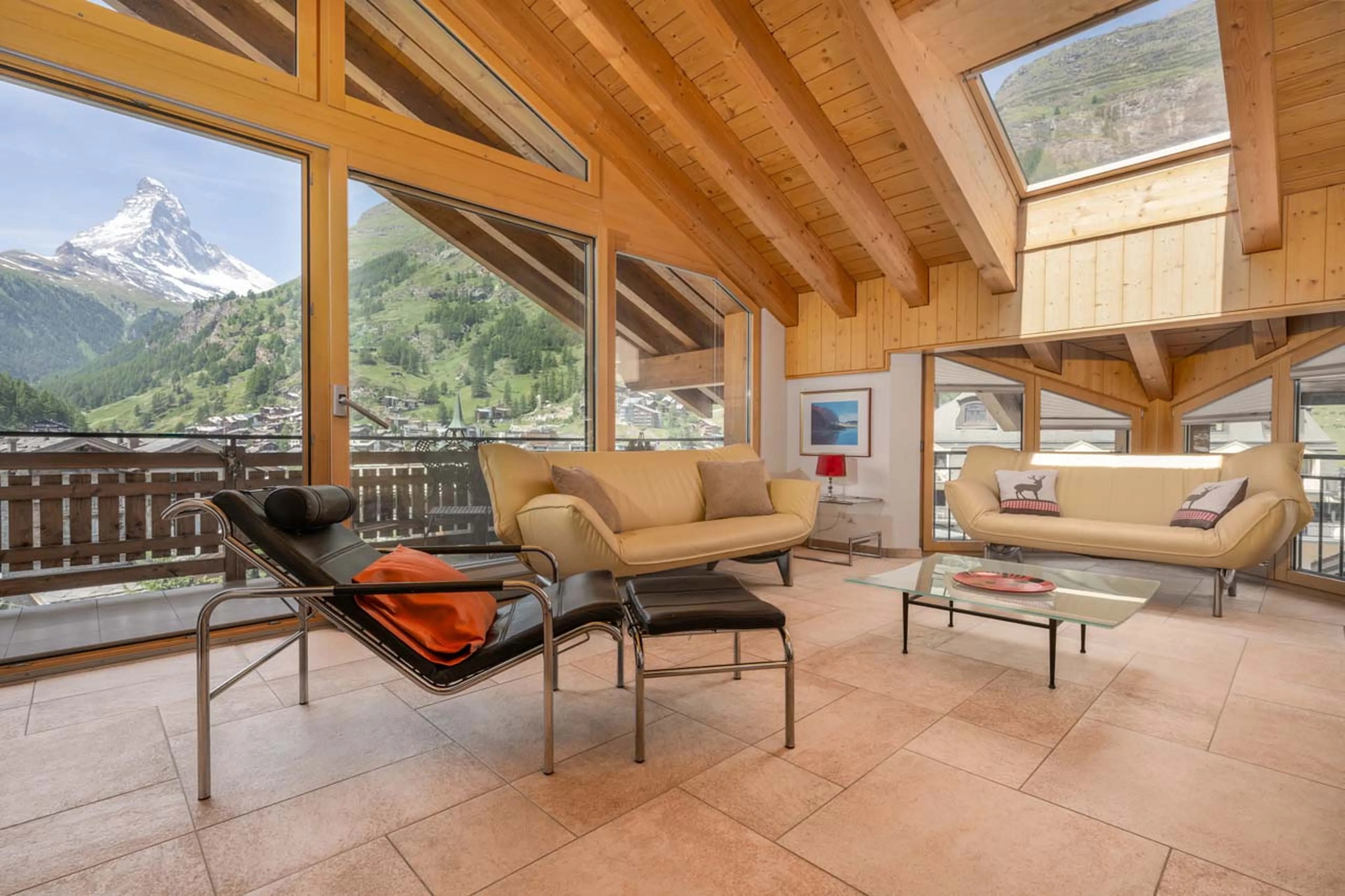 Bright and spacious living area at Penthouse Tiara in Zermatt