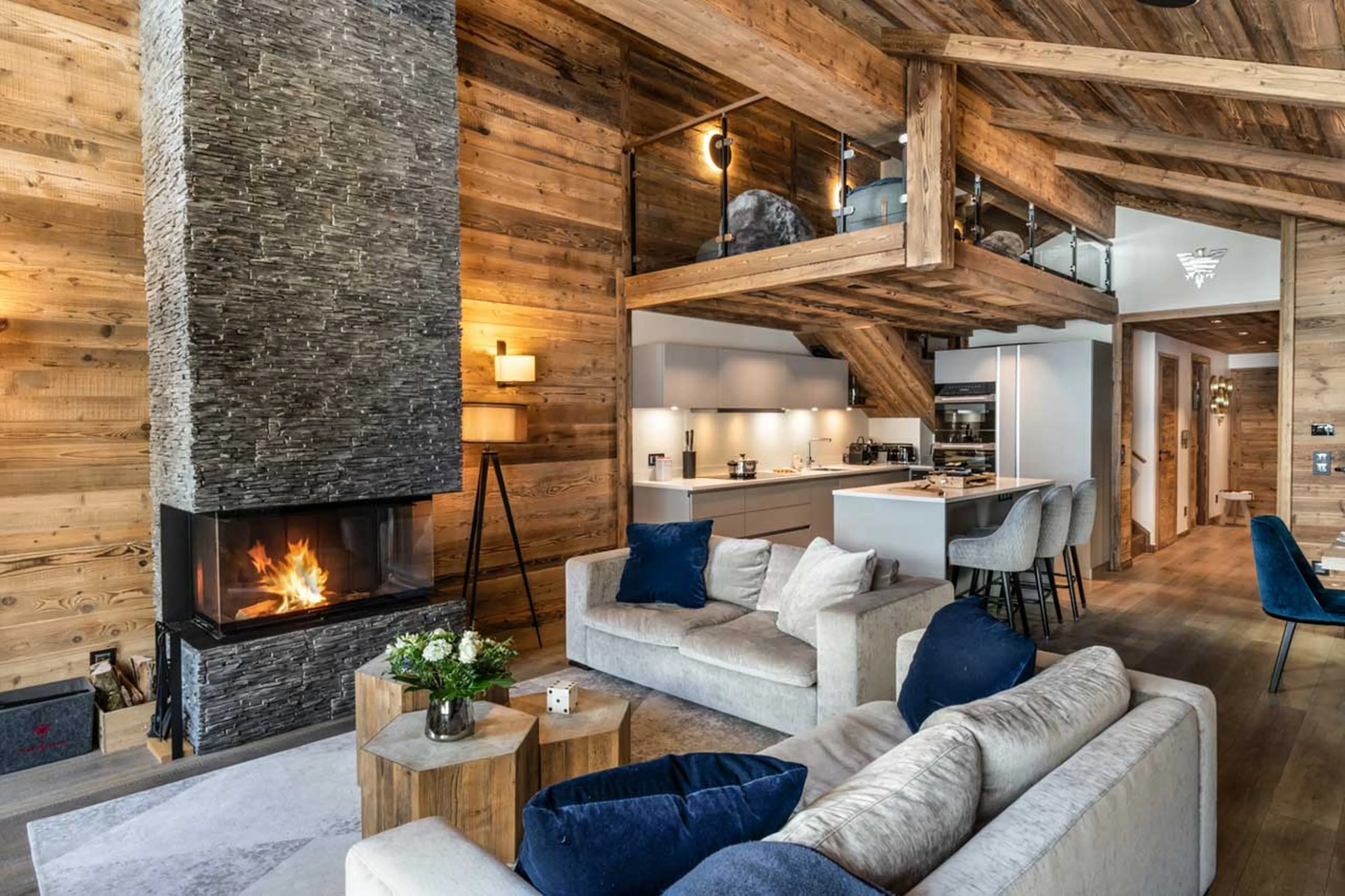 Living area and kitchen at Penthouse Vail Lodge A32 in Val d'Isere
