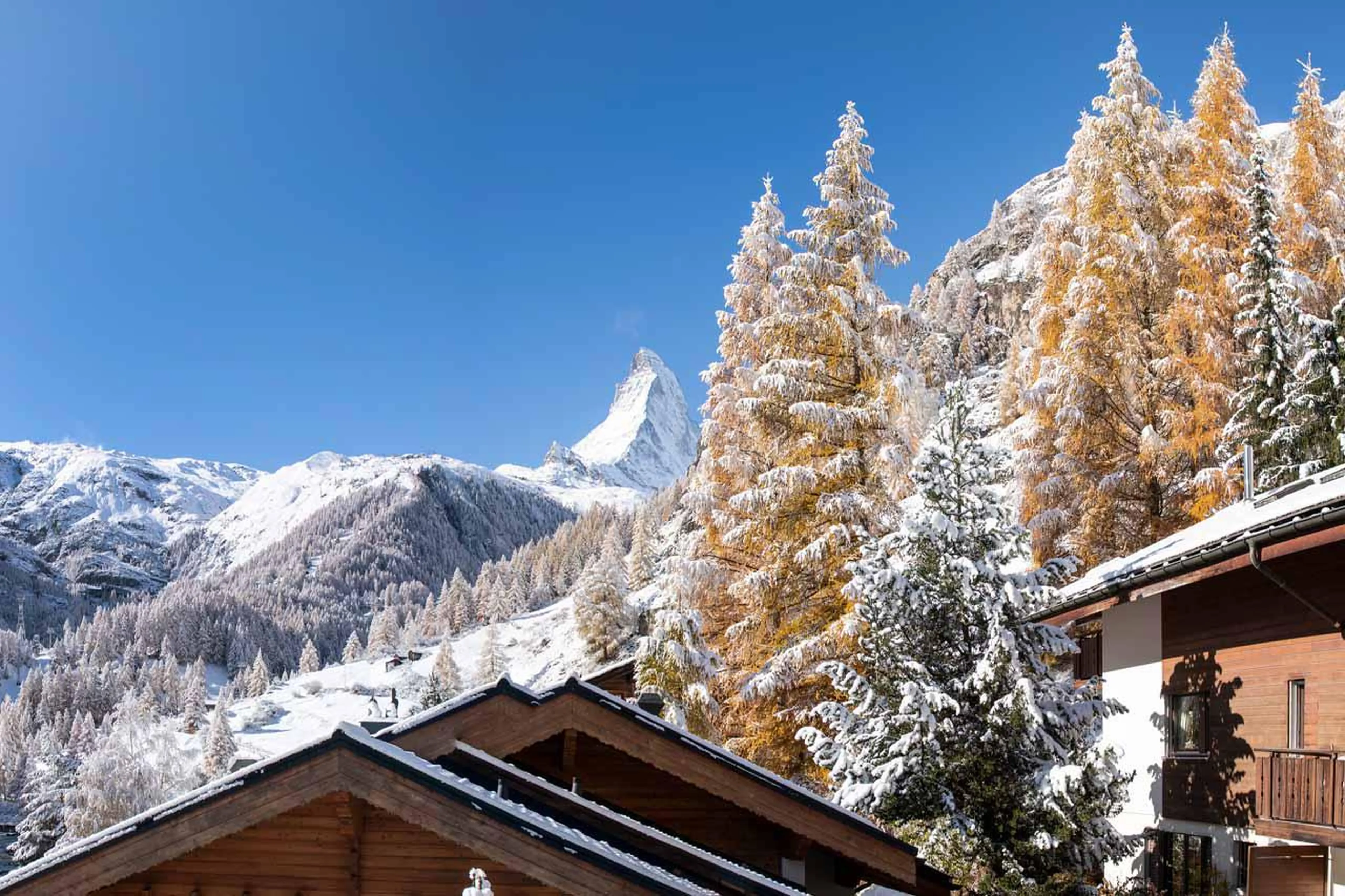 Snowy mountain views from the balcony at Penthouse Zen in Zermatt