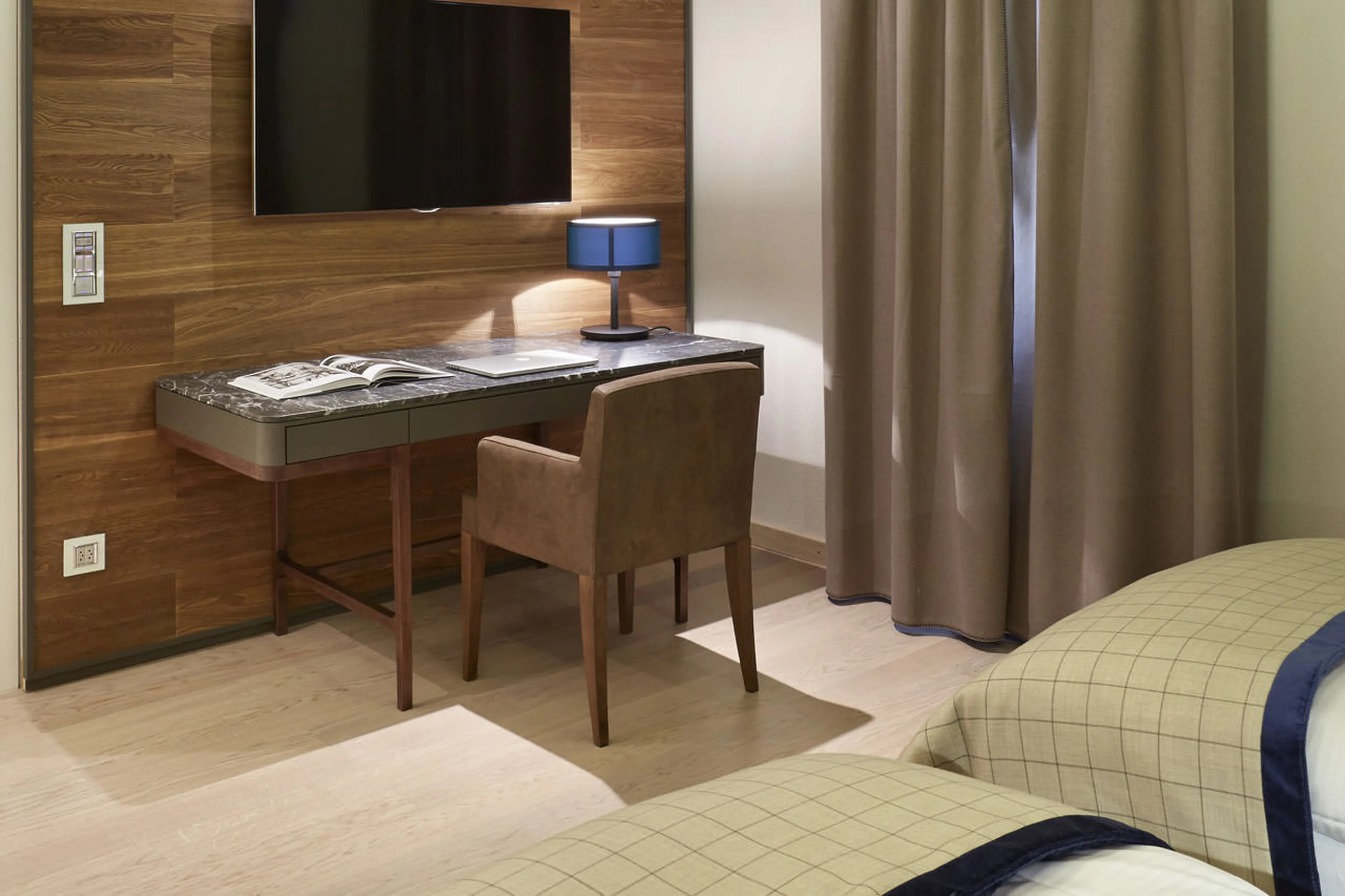 TV in bedroom at Piz Alv in St Moritz