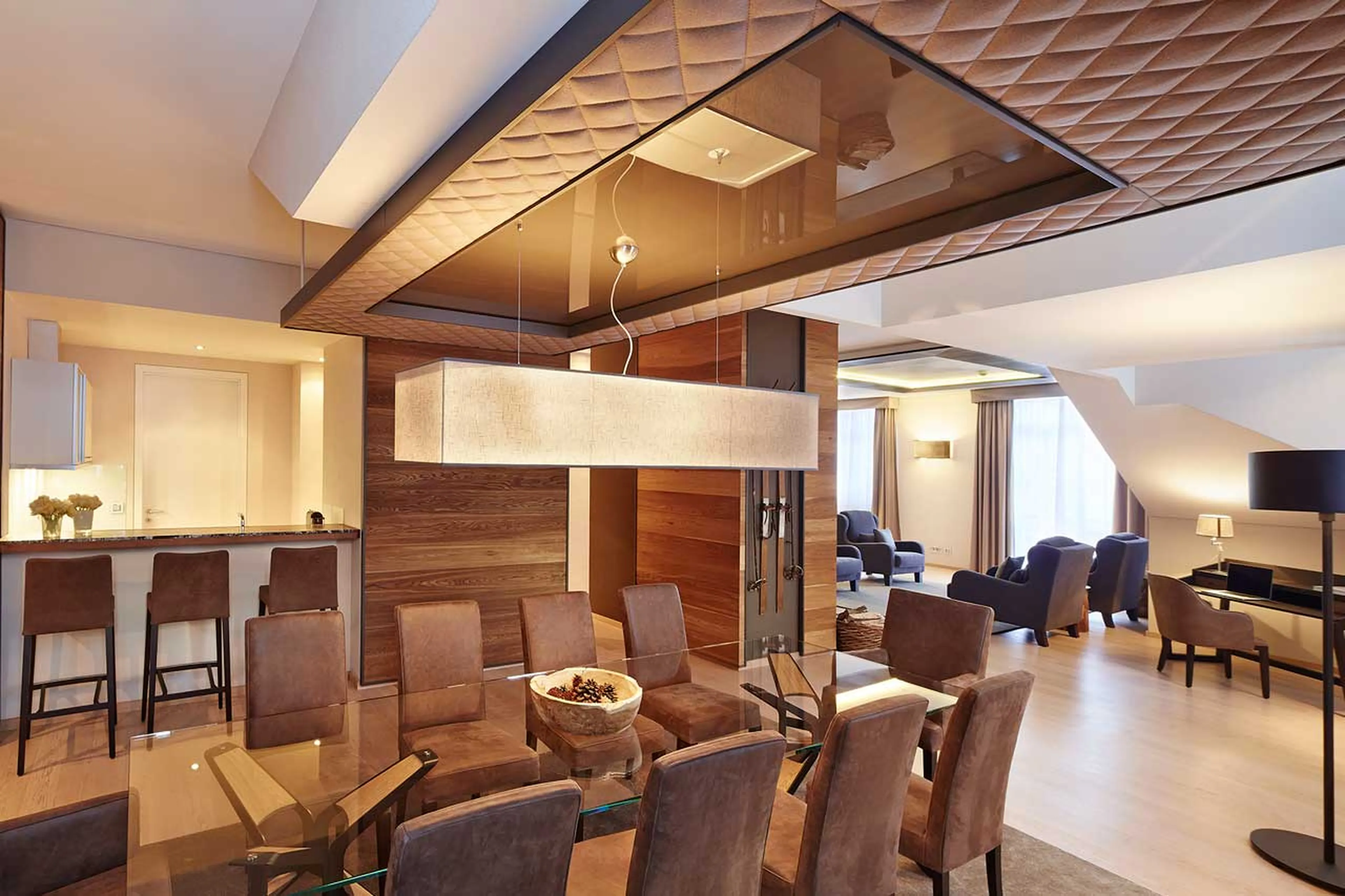 Dining room and kitchen at Piz Bellavista in St Moritz