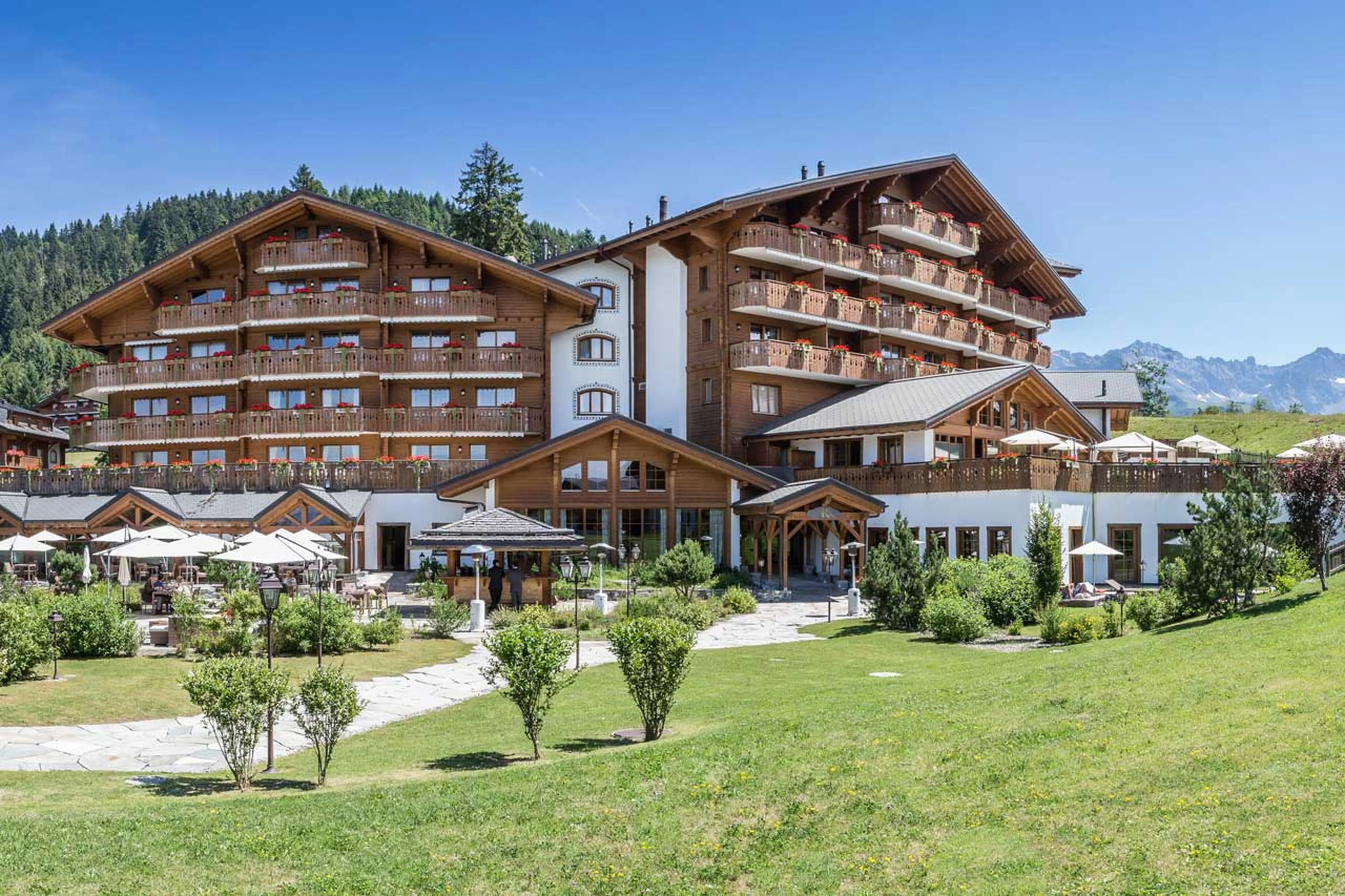 Exterior of Chalet Royalp Hotel & Spa in Villars in summer