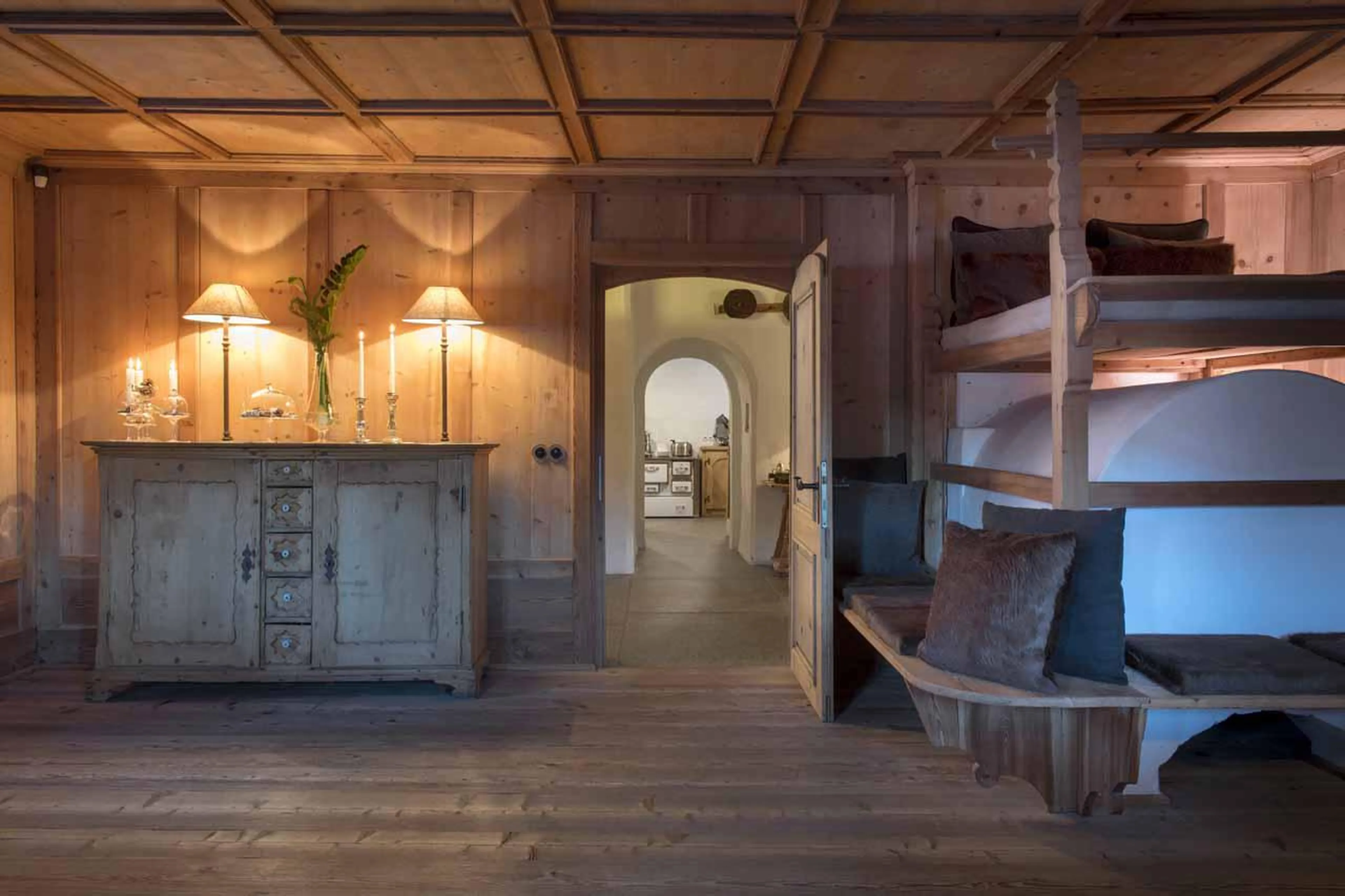 Stube and kitchen at San Lorenzo Mountain Lodge in Kronplatz