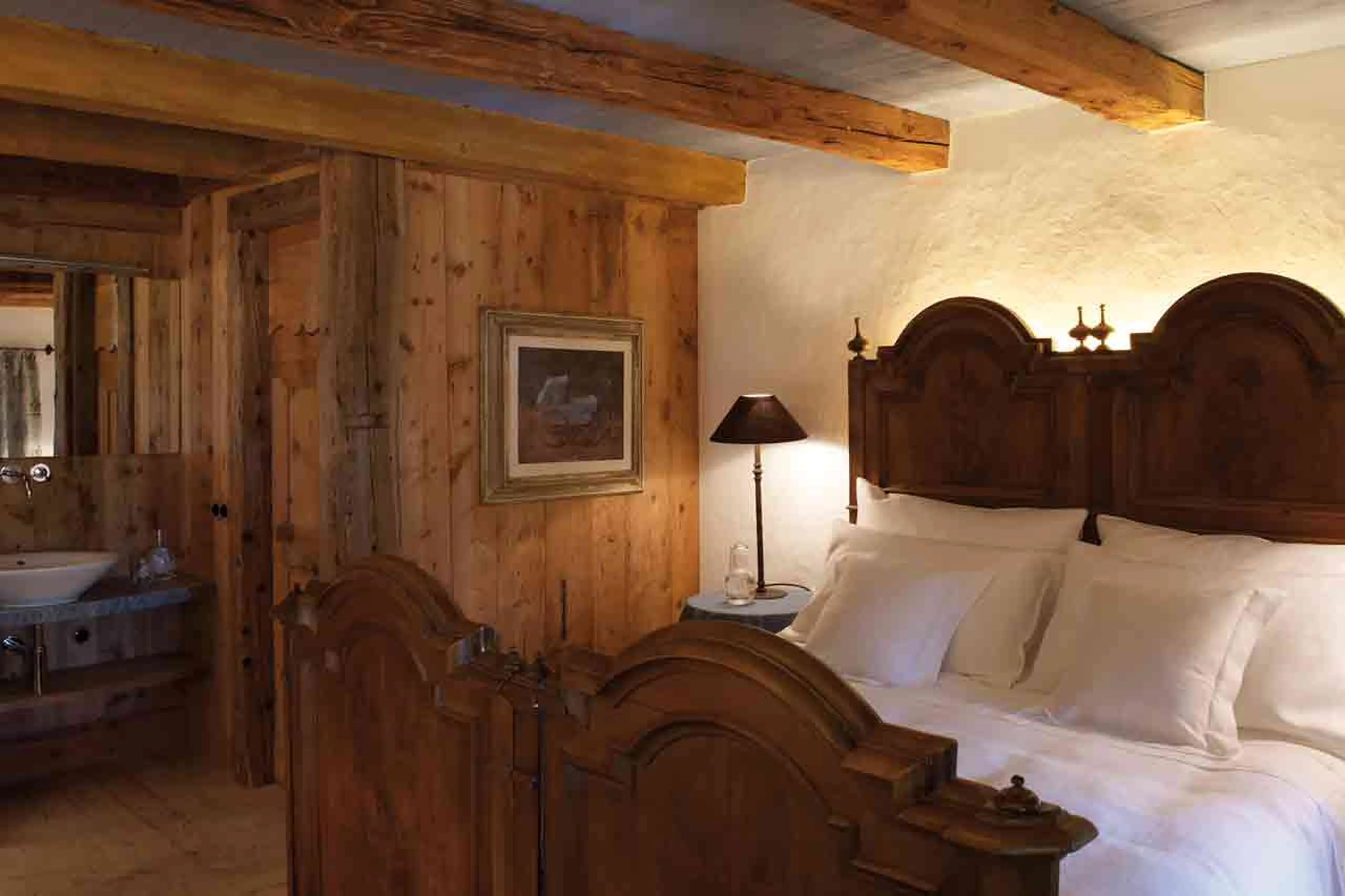 Bedroom one at San Lorenzo Mountain Lodge in Kronplatz