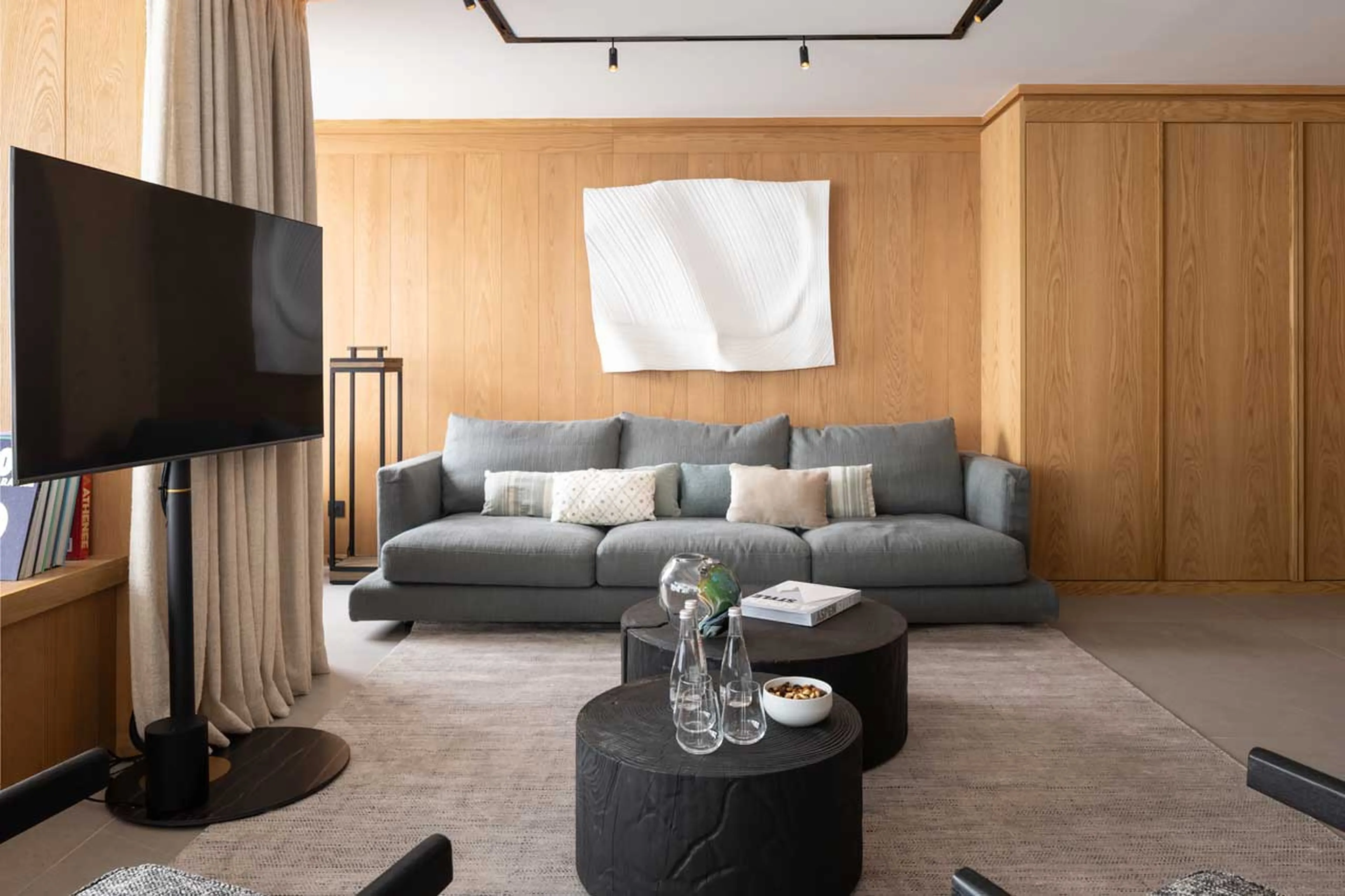 Sofa and TV in Sasha Apartment 3, Courchevel 1850