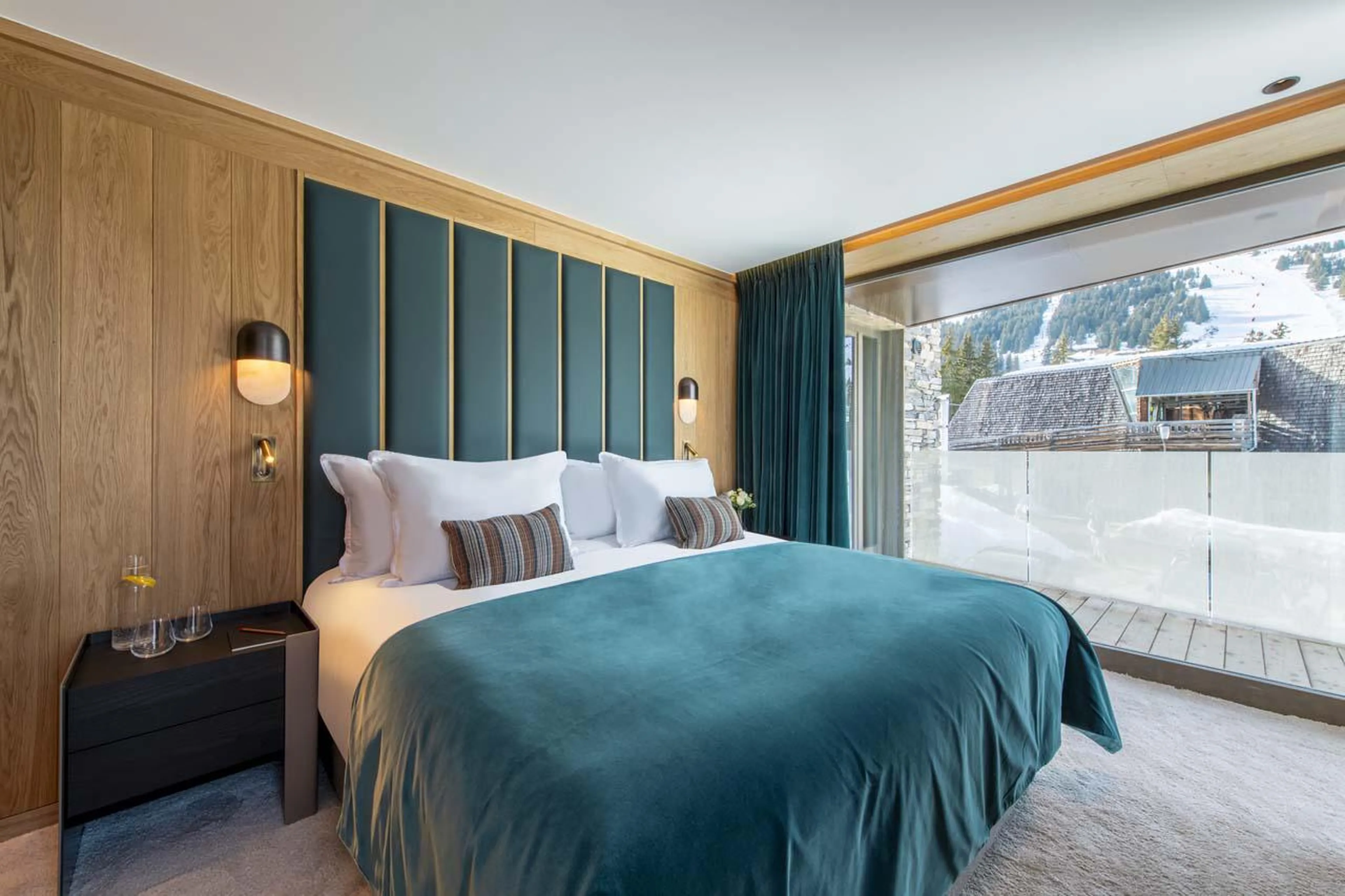 Double bedroom with en-suite shower room at Sasha Apartment 4 in Courchevel 1850