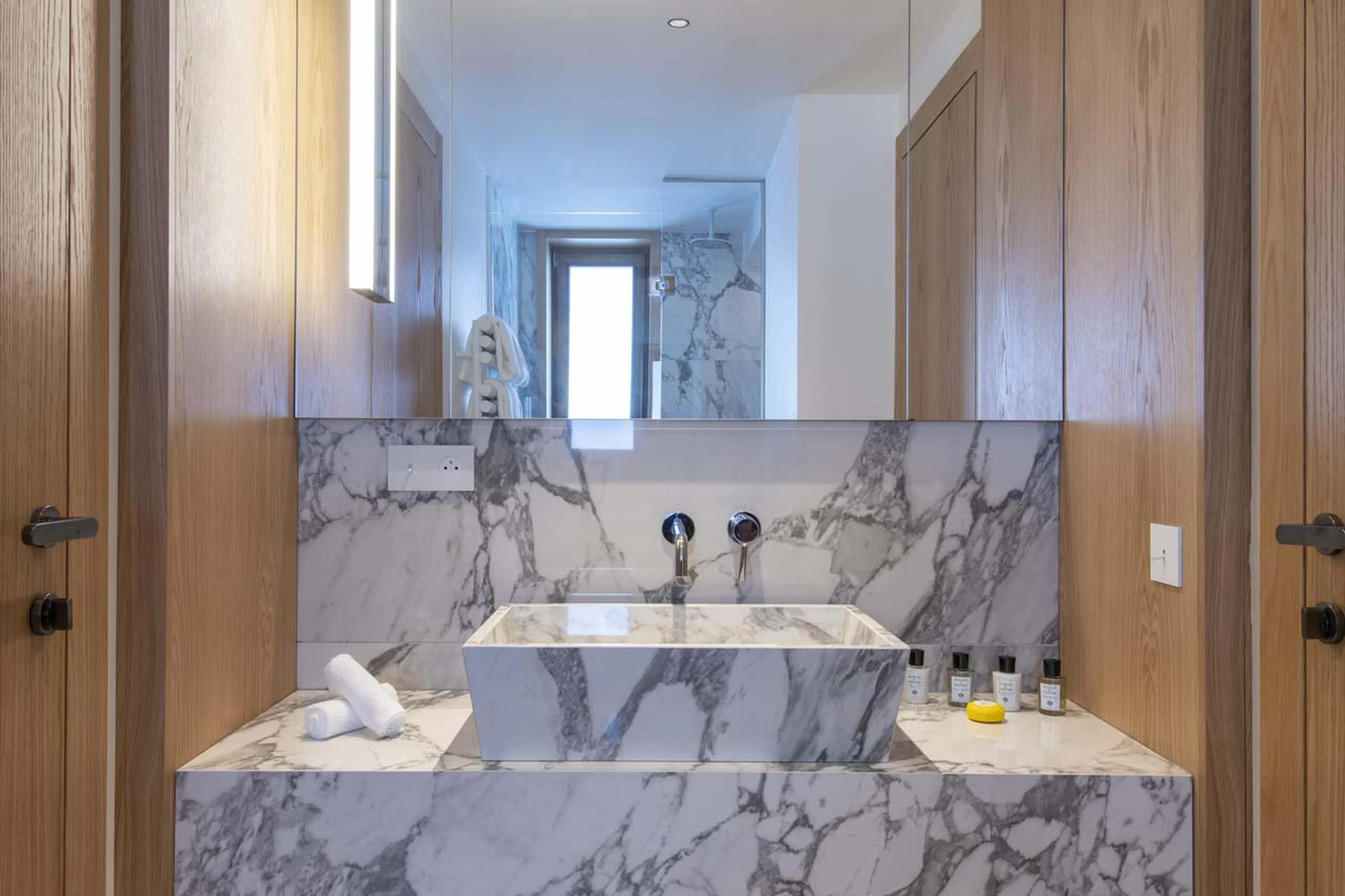 Shower room shared between bedrooms four and five at Sasha Apartment 4 in Courchevel 1850