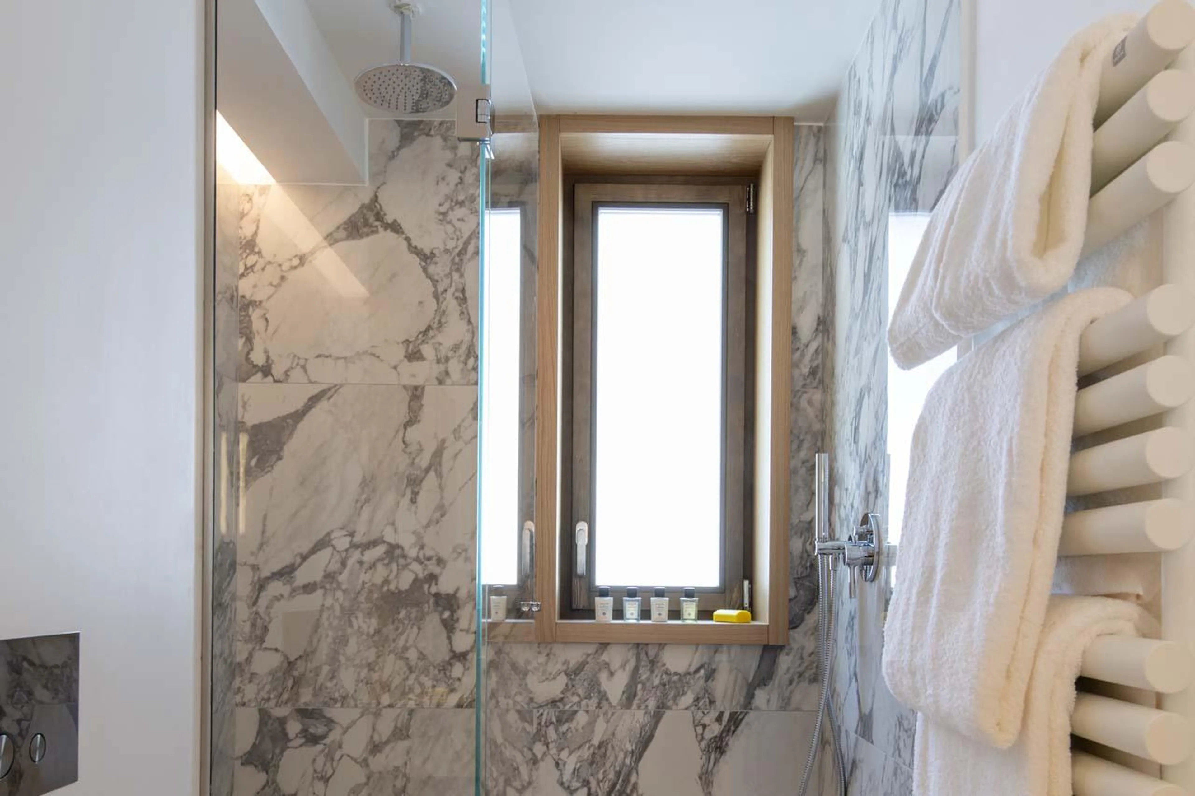 Shower room shared between bedrooms four and five at Sasha Apartment 4 in Courchevel 1850