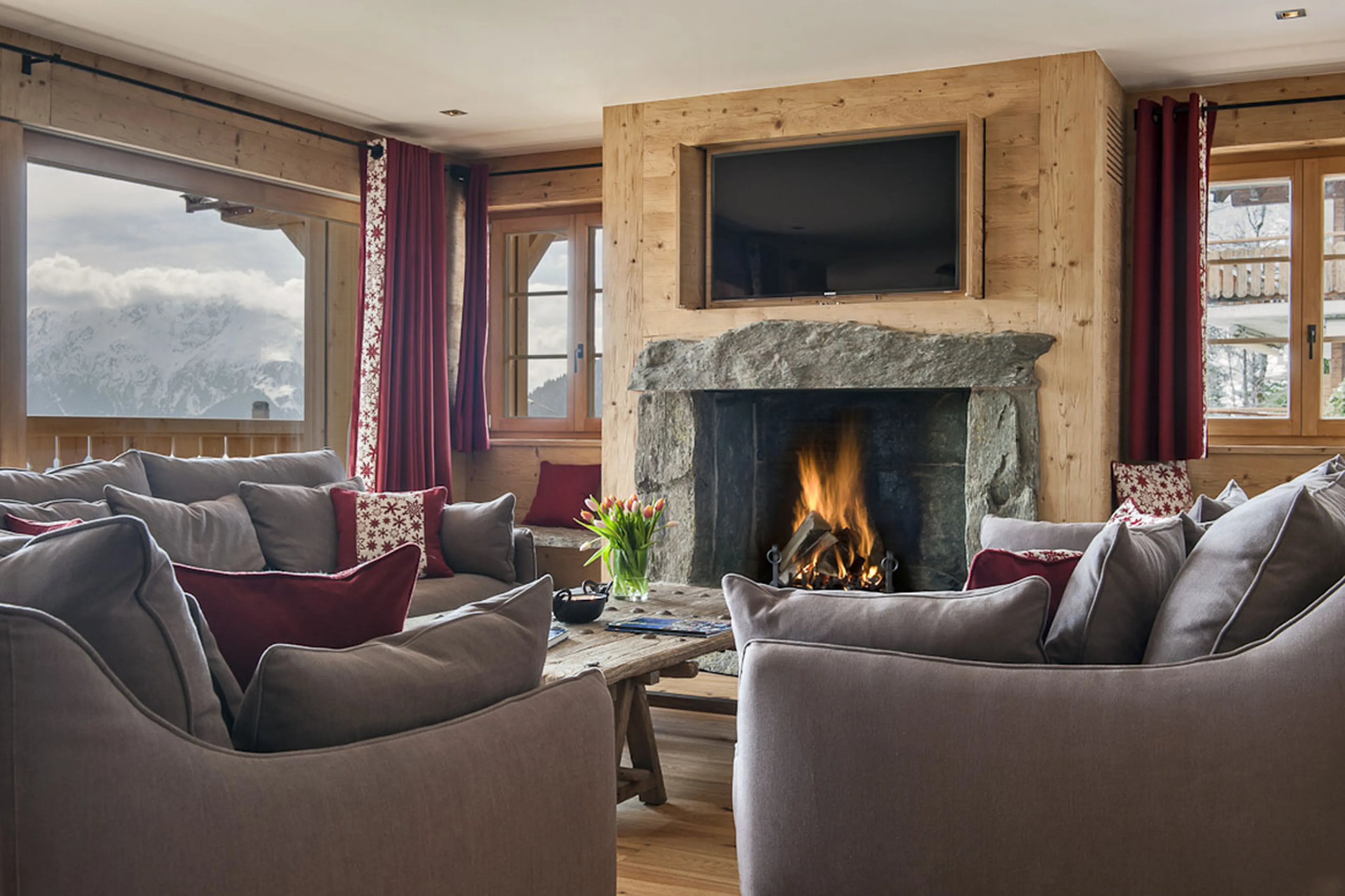 Fireplace in living area of Apartment Sayeu 116 in Verbier