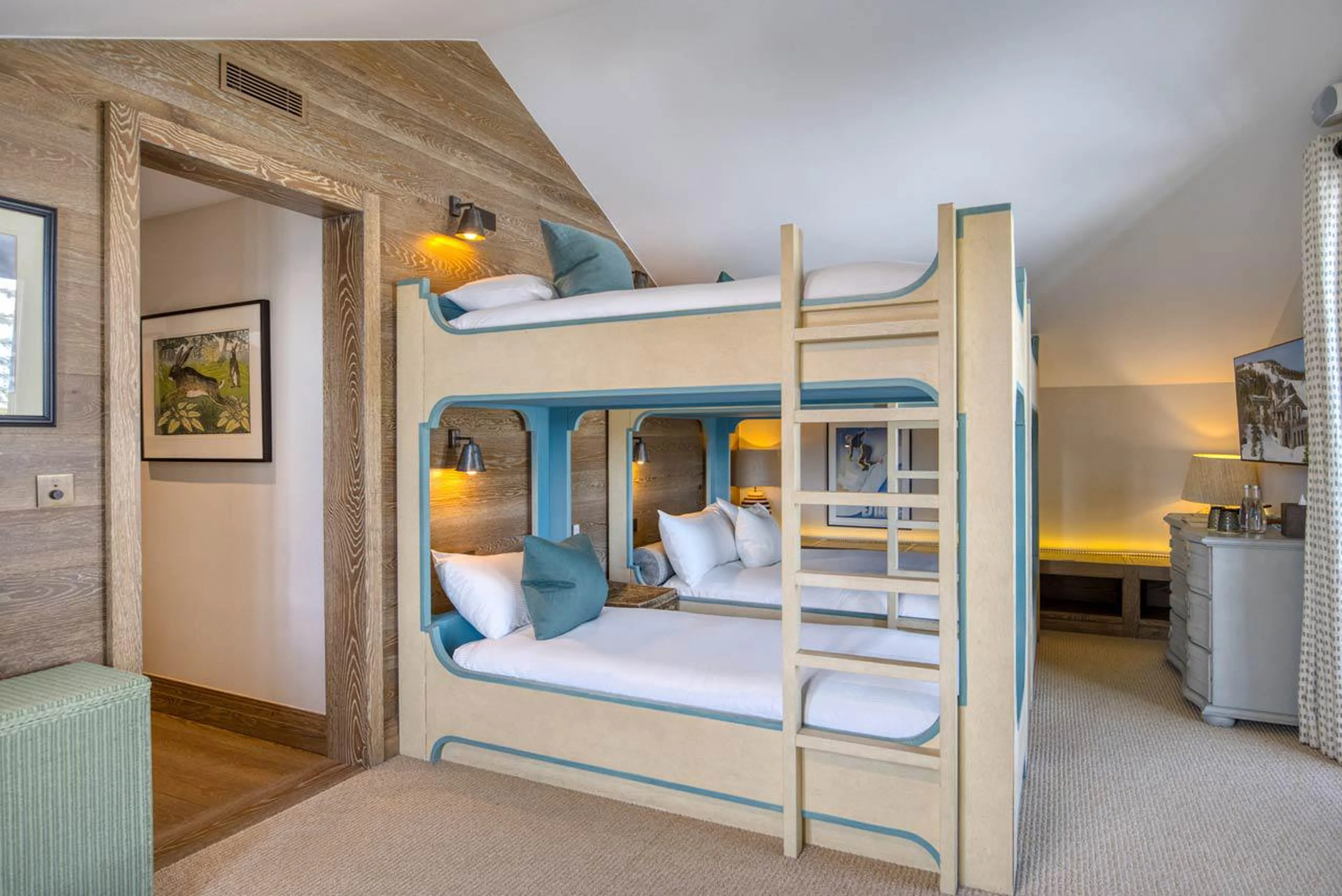 Bunk beds in bedroom one in Shemshak Lodge in Courchevel 1850