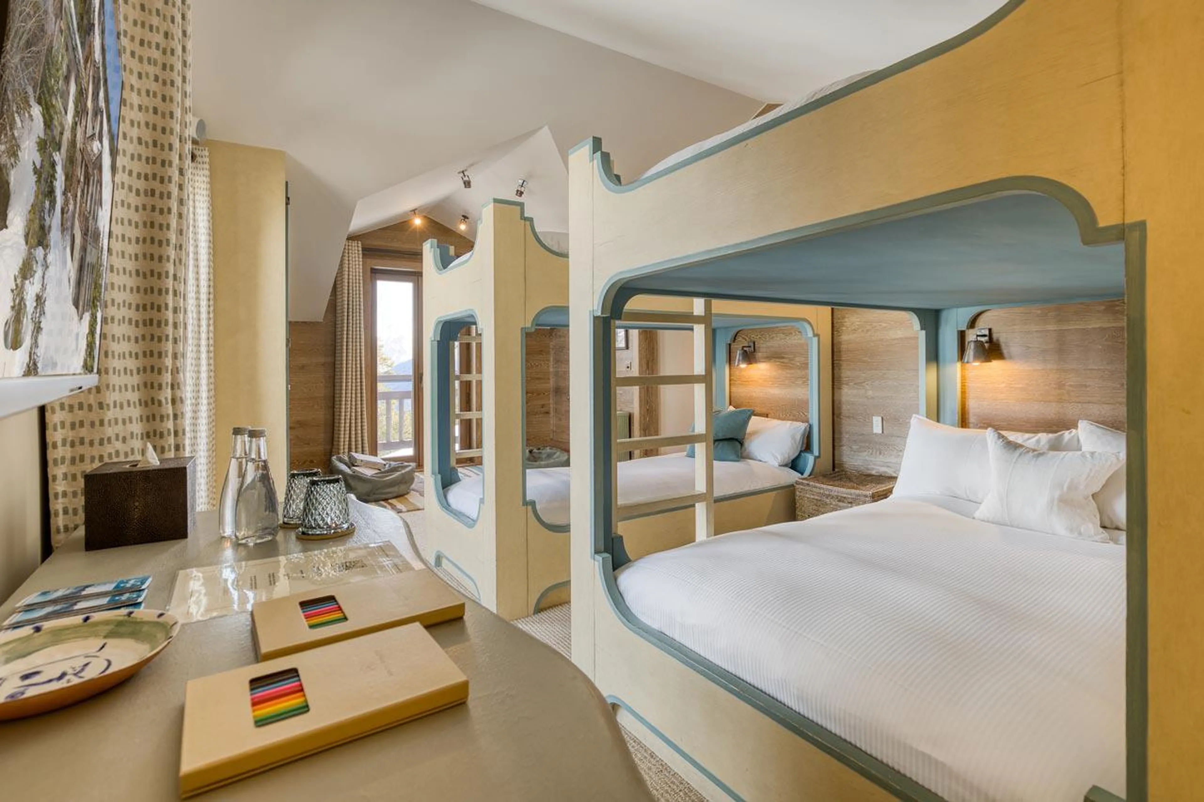 Two bunk beds in en-suite bedroom of Shemshak Lodge in Courchevel 1850