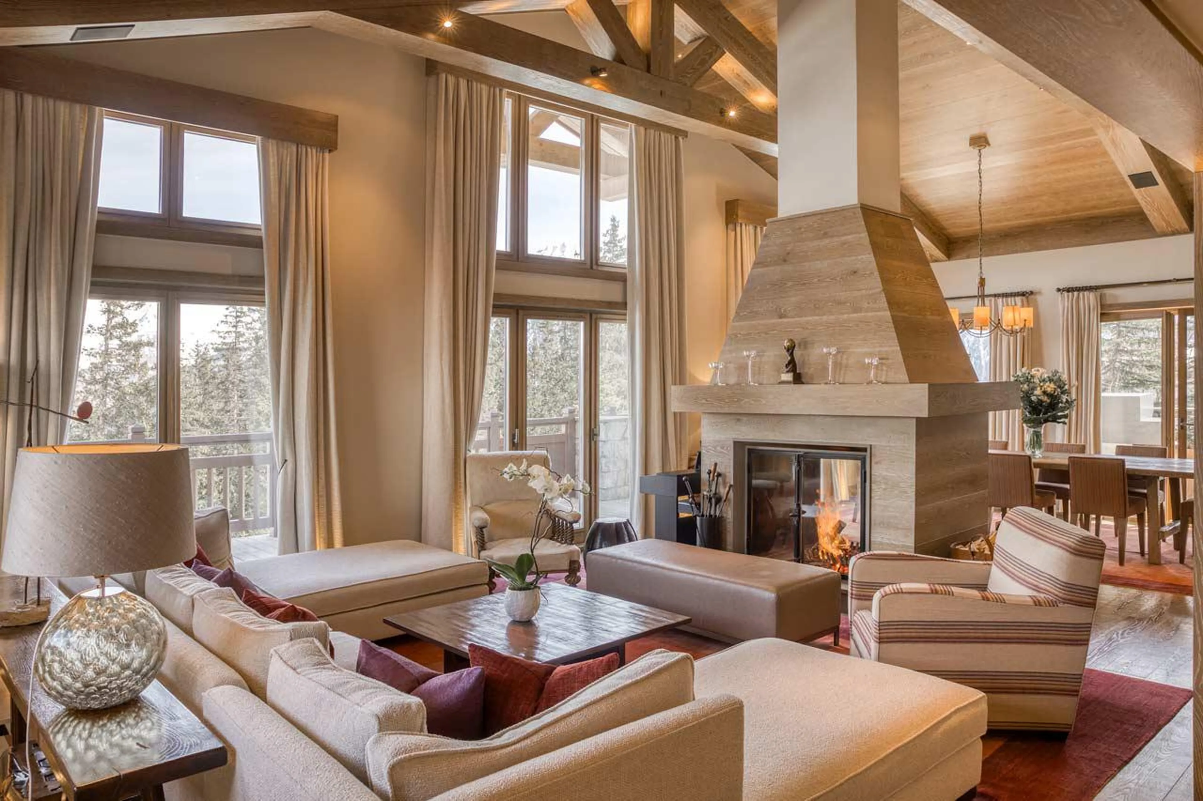 Extraordinary living space with French doors and terrace access in Shemshak Lodge in Courchevel 1850