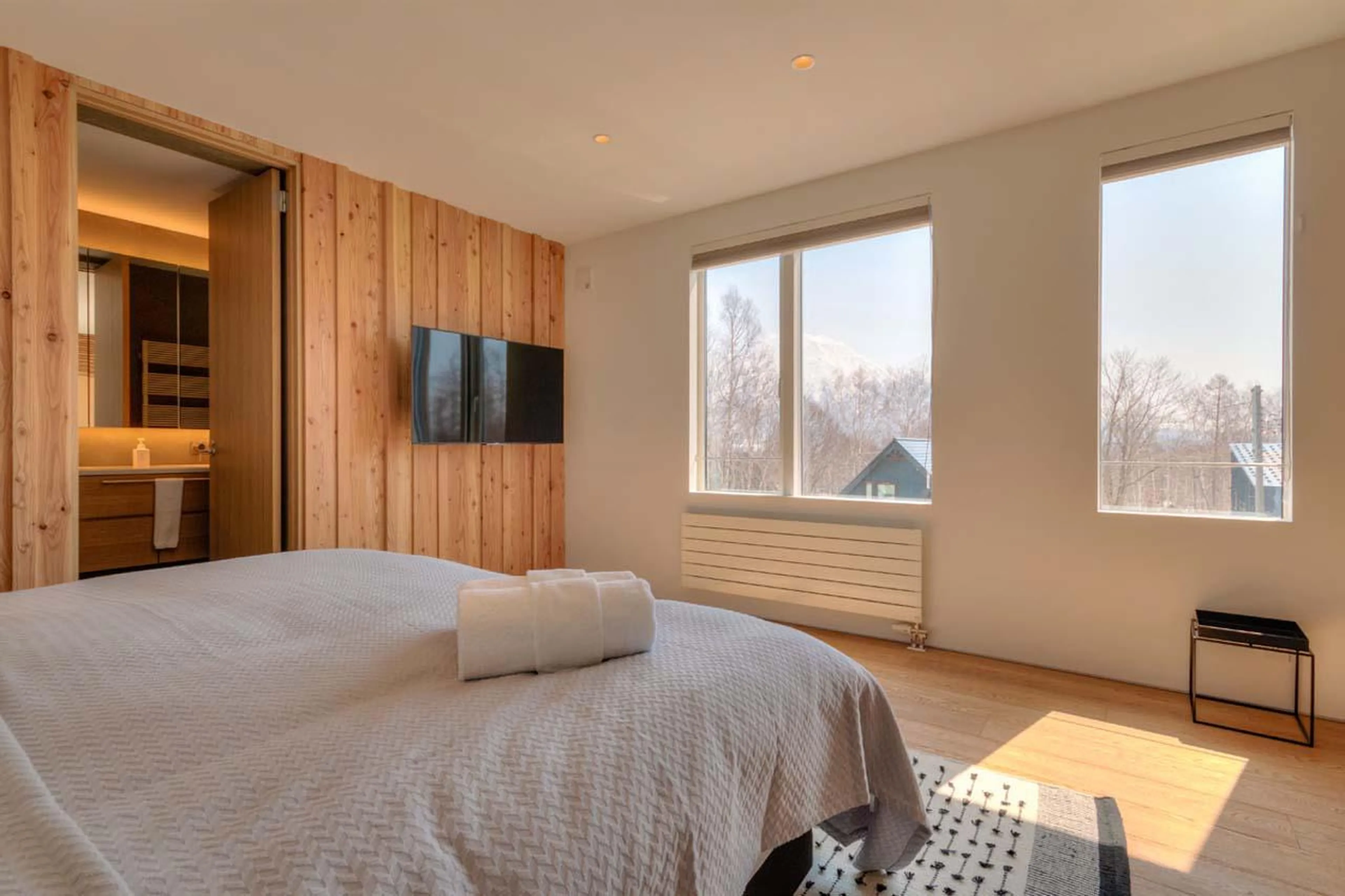 Double bedroom with en-suite shower room at Silver Dream in Niseko