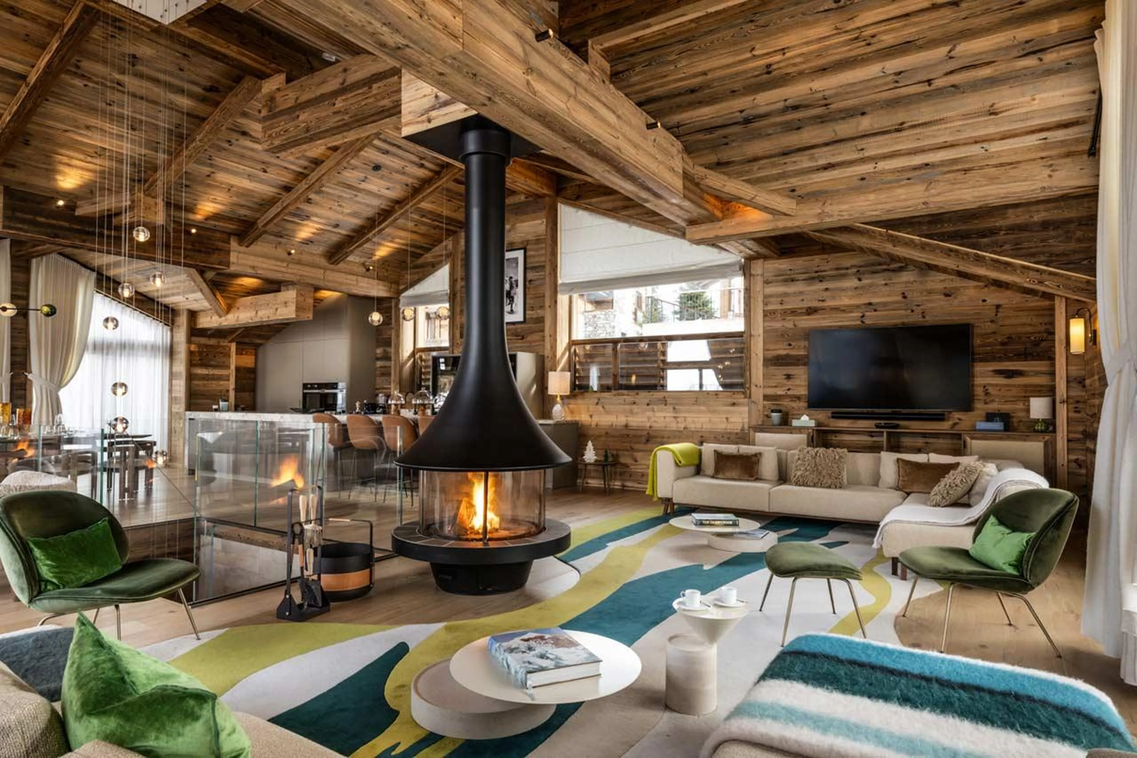 Spacious living area with two corner sofas at Silverstone Altitude 7 in Val d'Isere