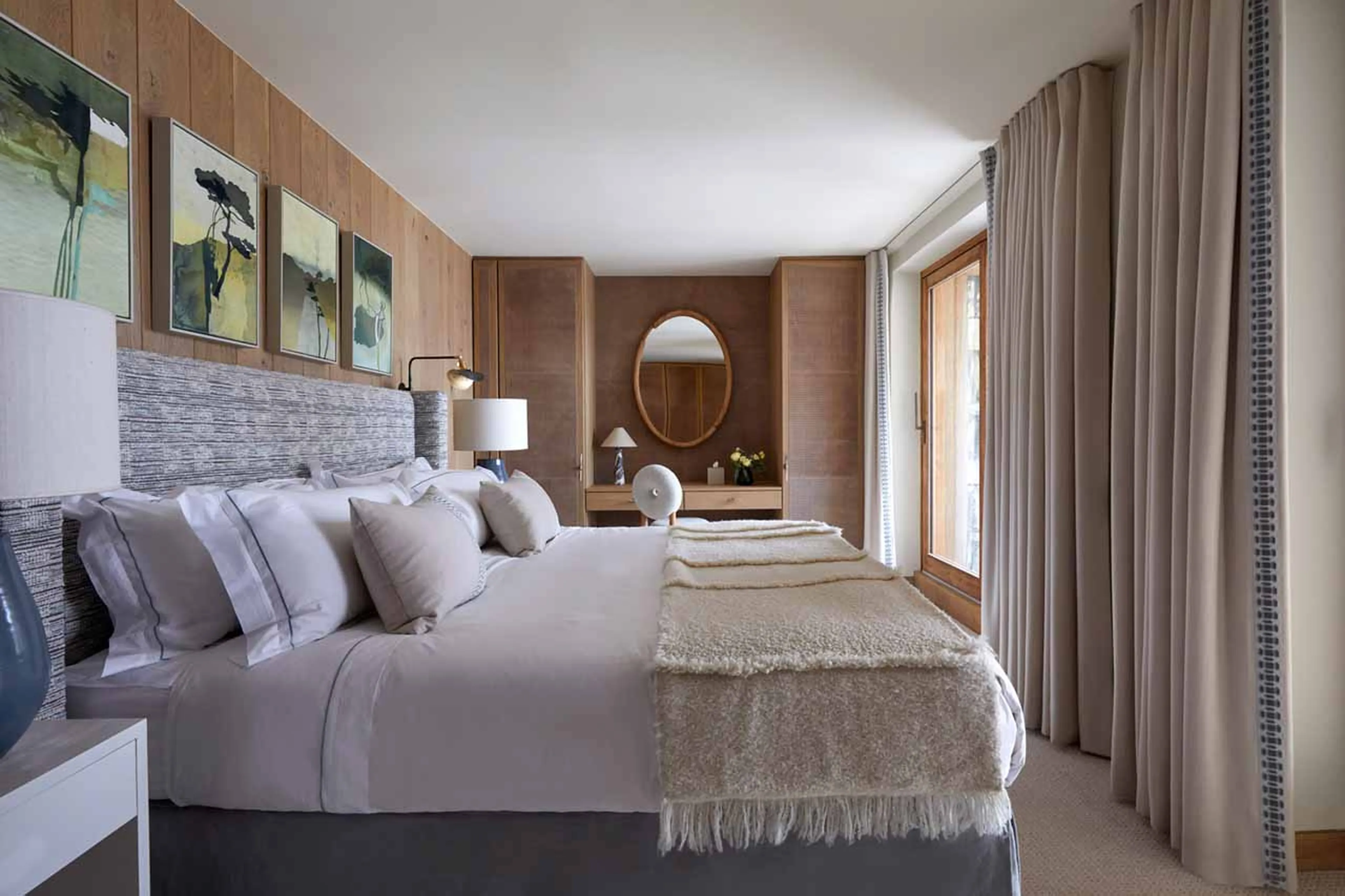 Double bedroom with king-size bed at Silverstone Lodge Penthouse 4 in Val d'Isere