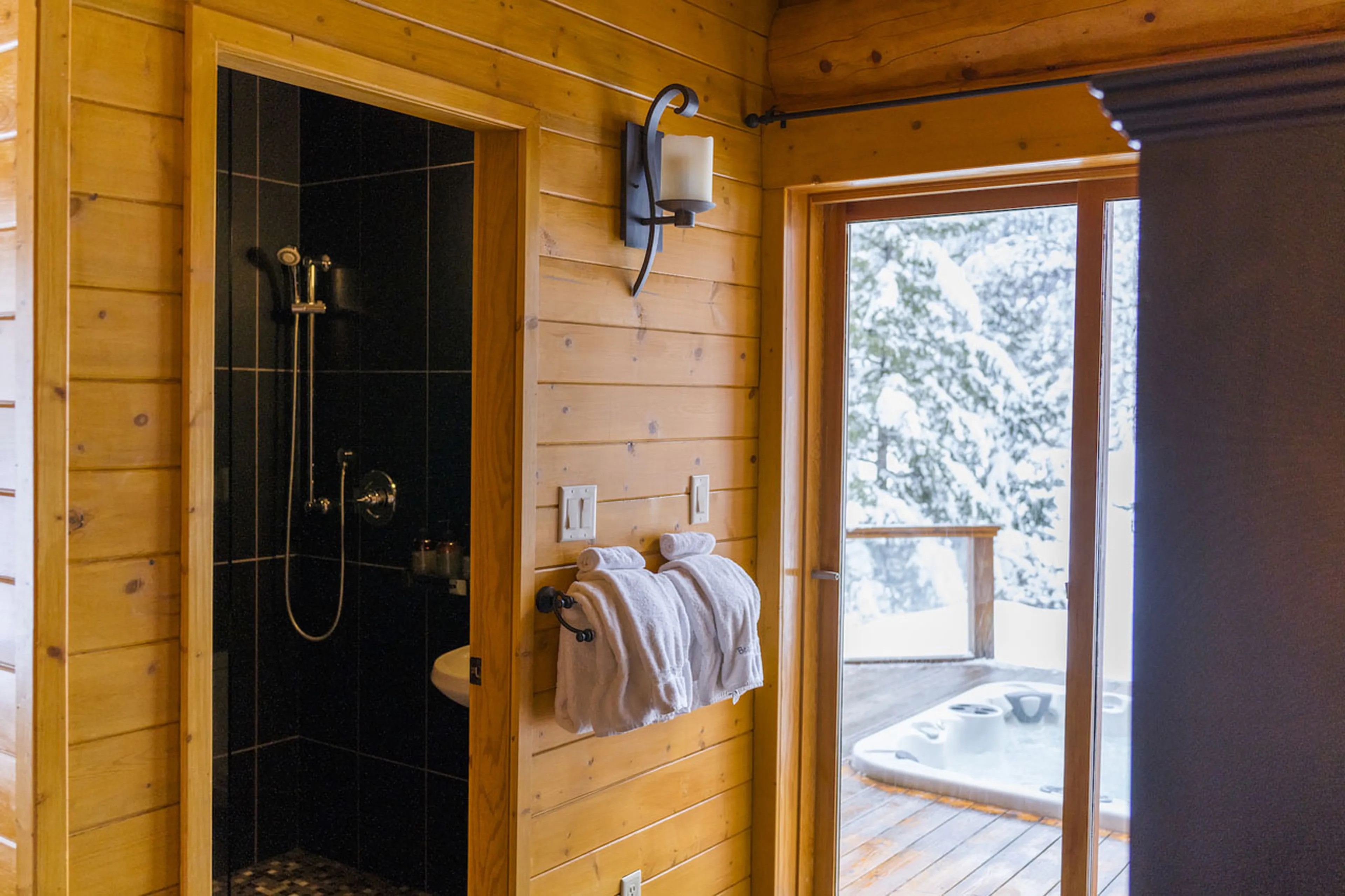 Shower room & hot tub access at Spirit Bear Lodge in South Chilcotin, British Columbia