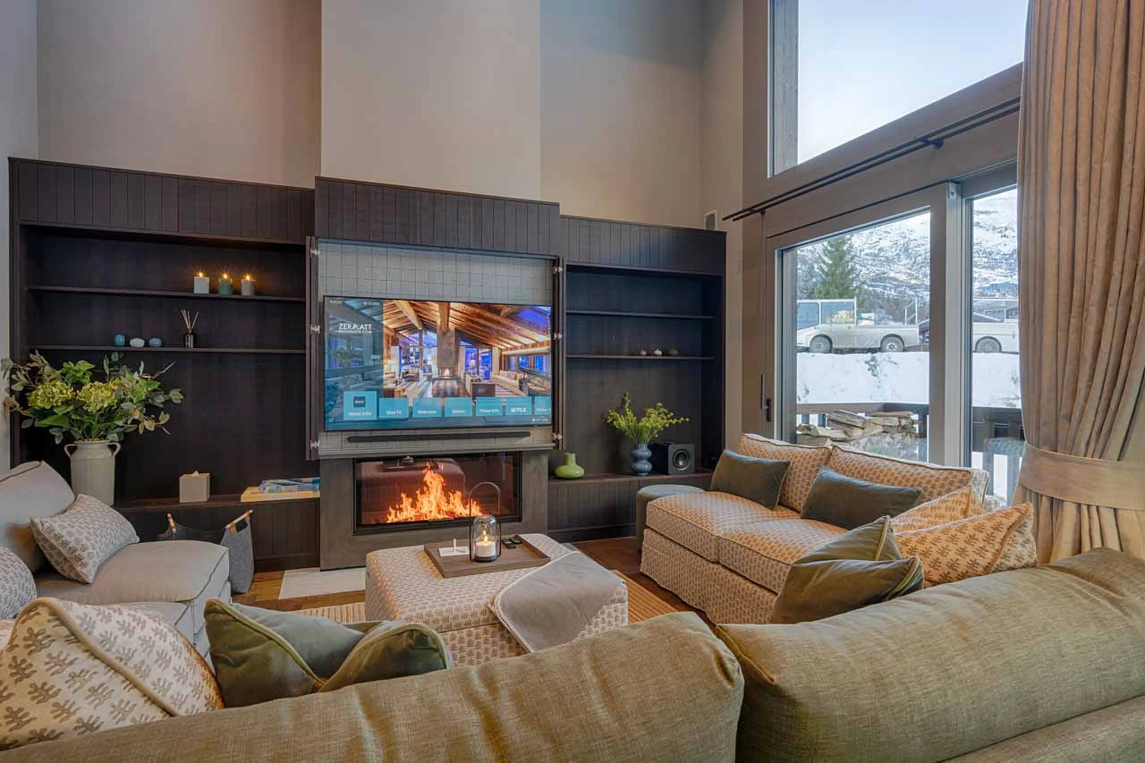 Living area fireplace at Tete Blanche Lodge in Zermatt
