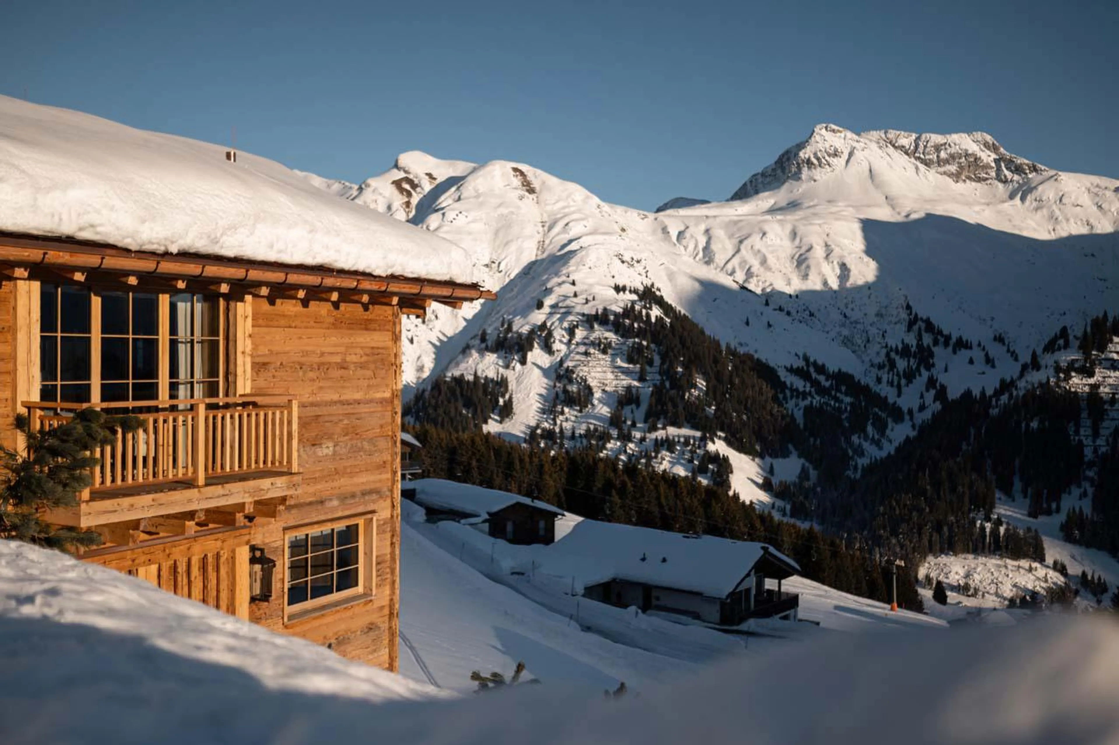 The Barn overlooking the snowy mountain peaks in Lech