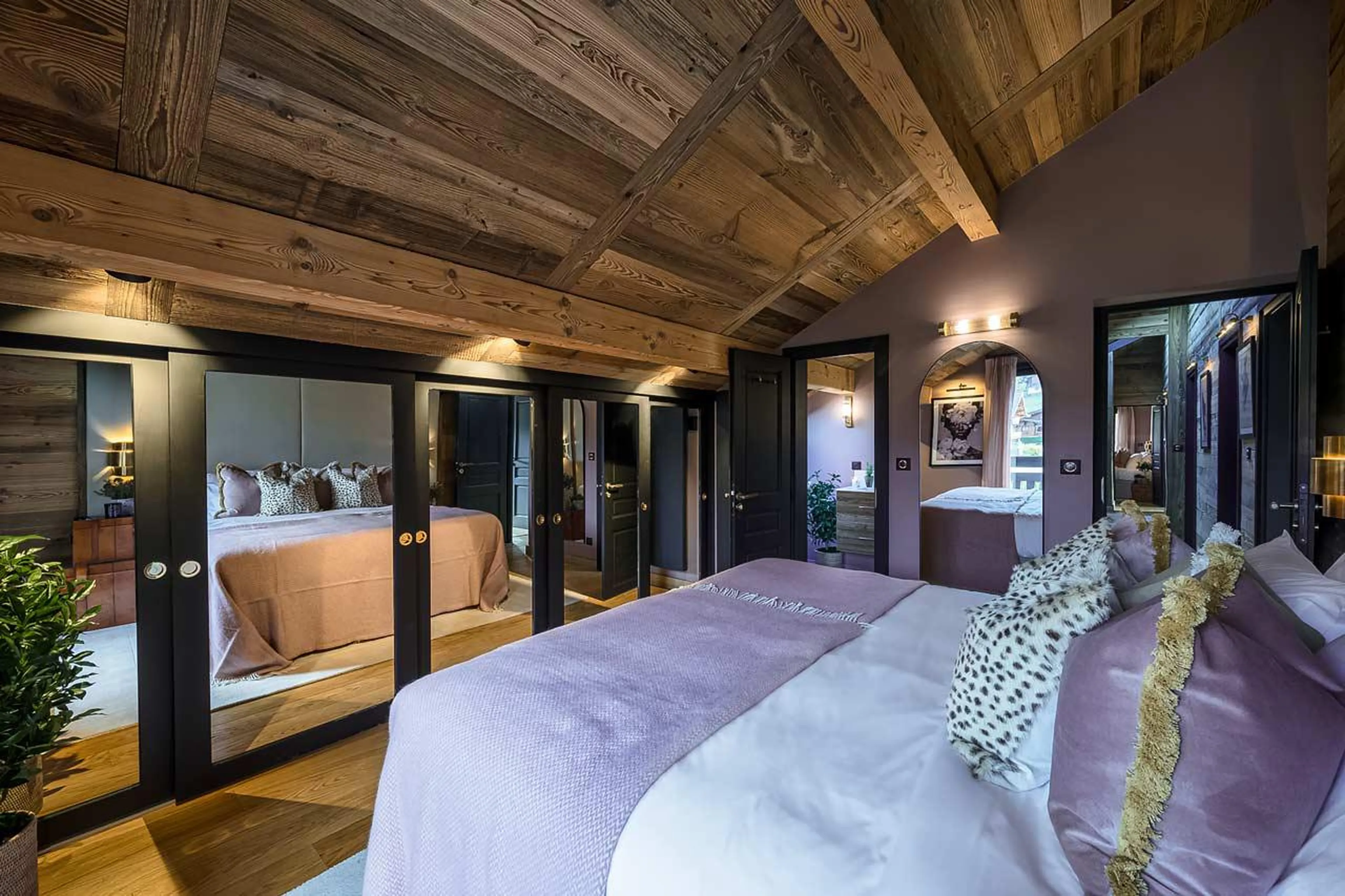 Bedroom one with mirrored storage at The Bungo in Morzine
