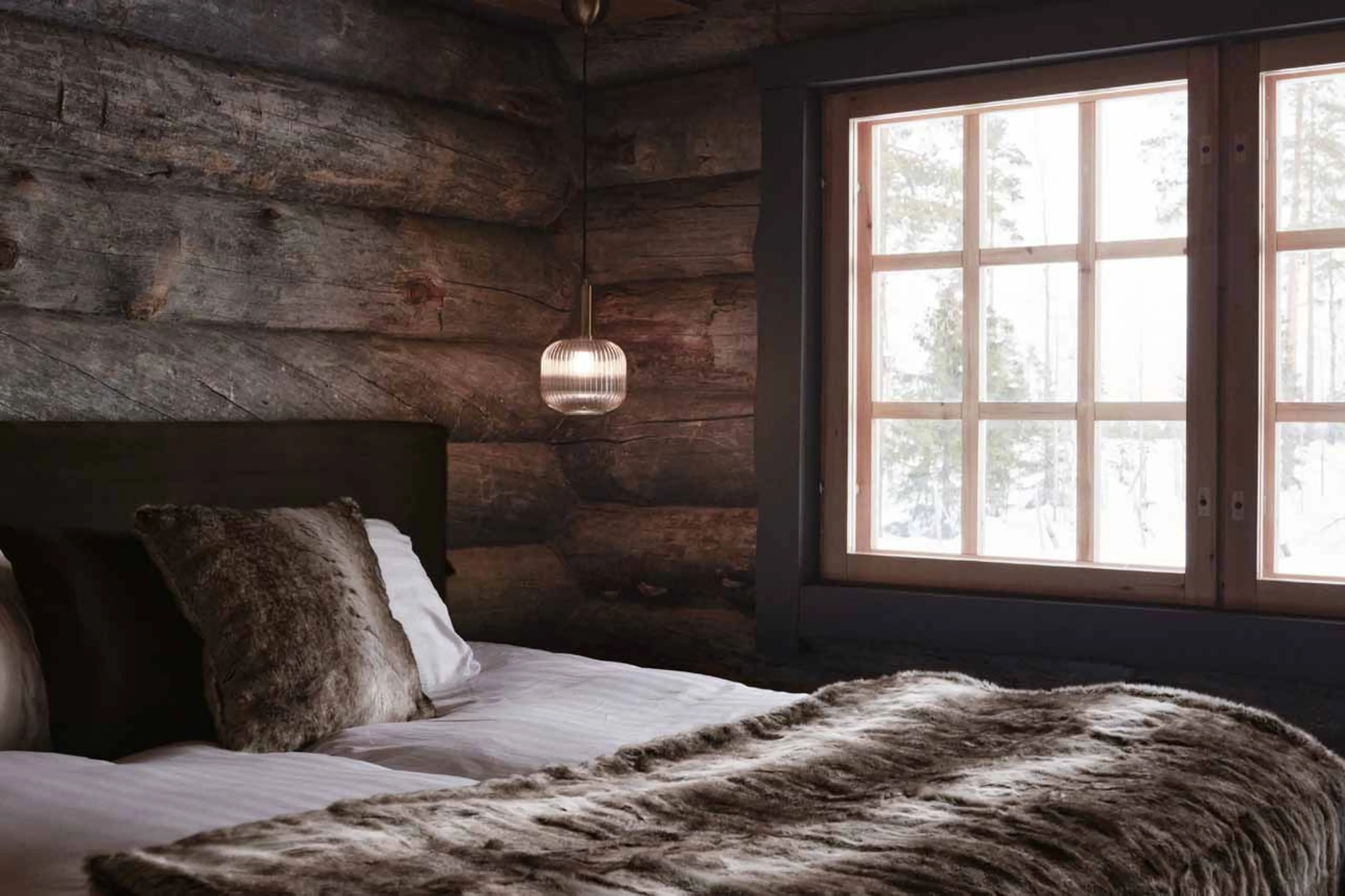 Double bed in The Fell Lodge, Finland