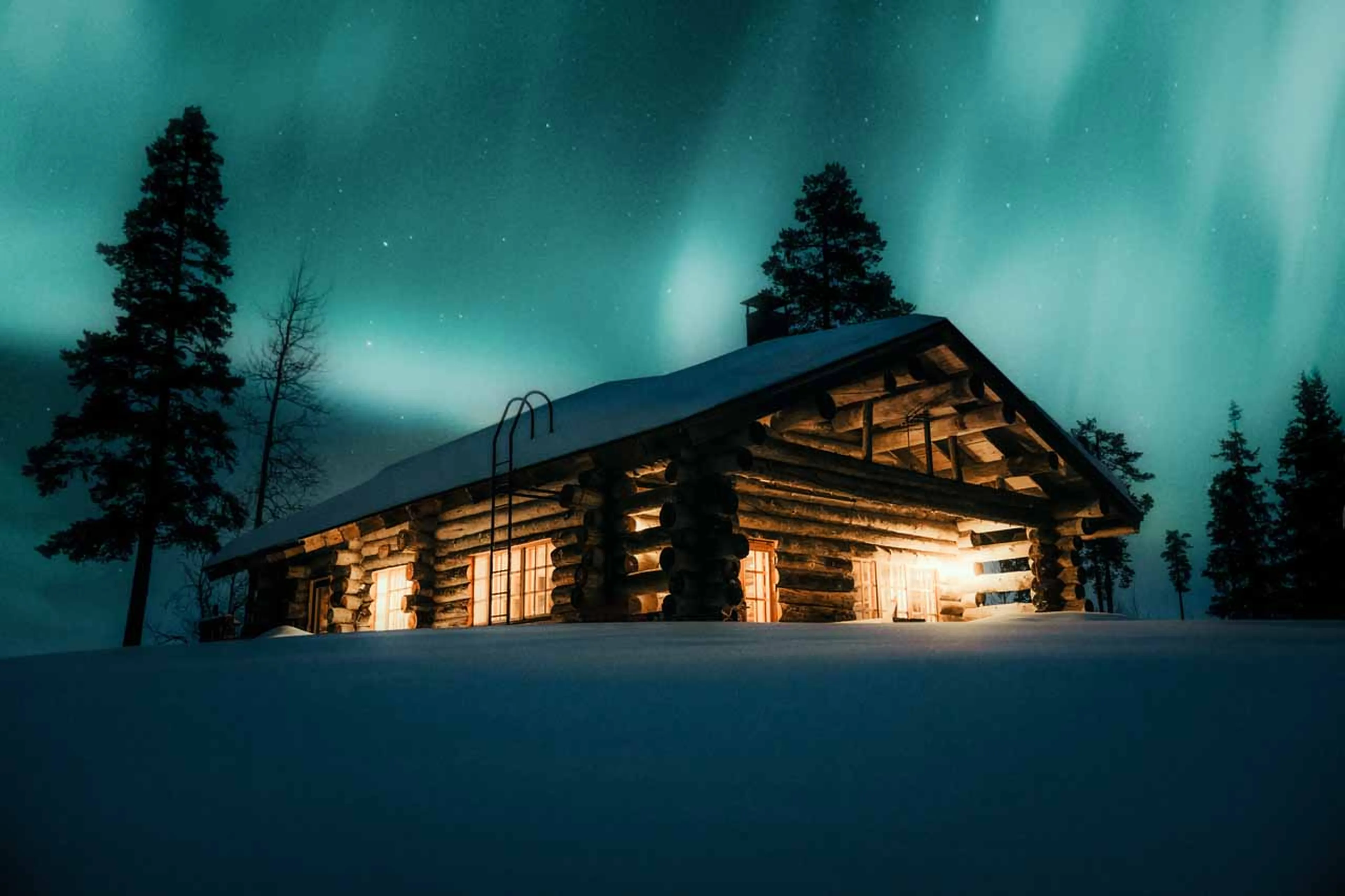 Exterior of The Fell Lodge, Finland with Northern lights
