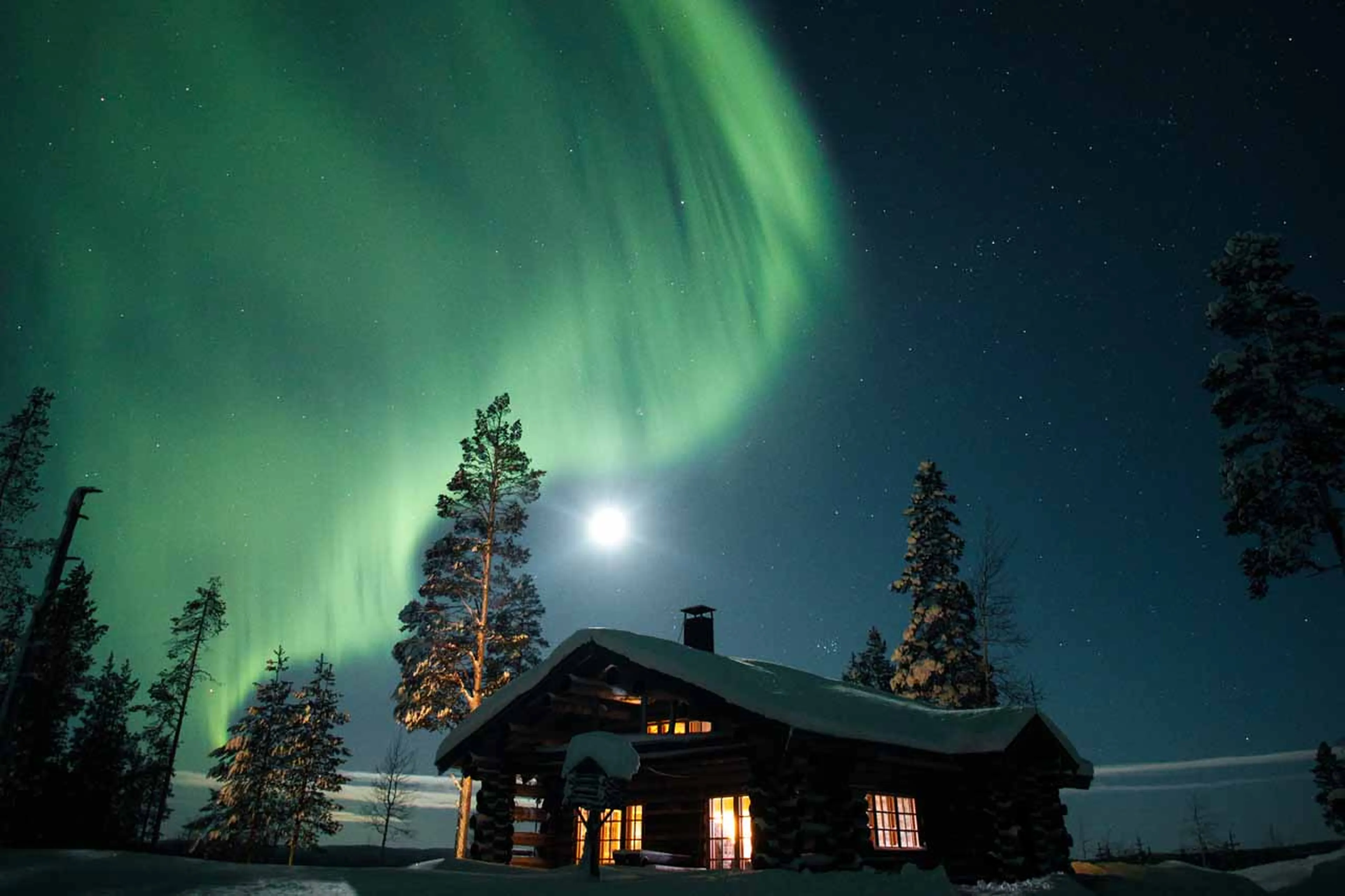 Exterior of The Fell Lodge, Finland with Northern lights