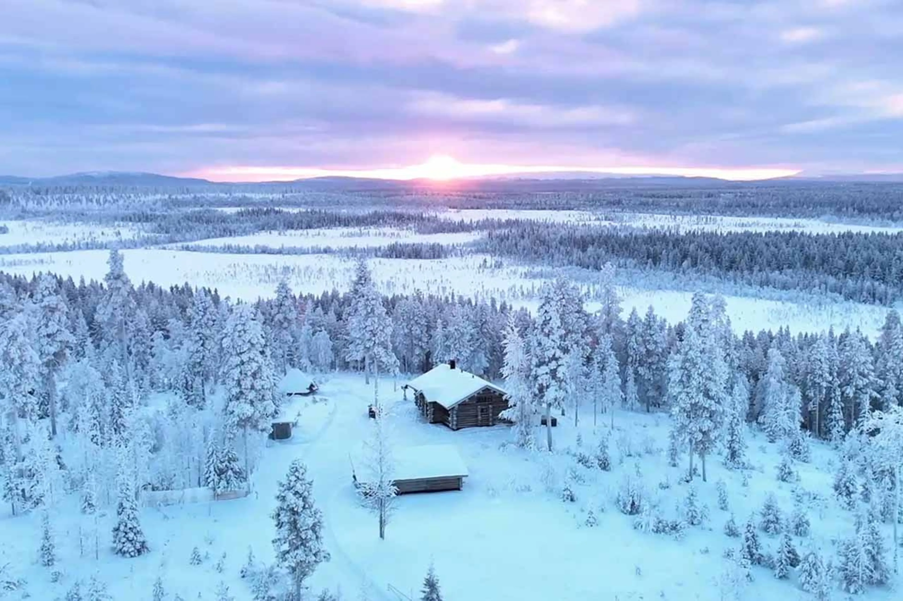 Exterior of The Fell Lodge, Finland at sunset