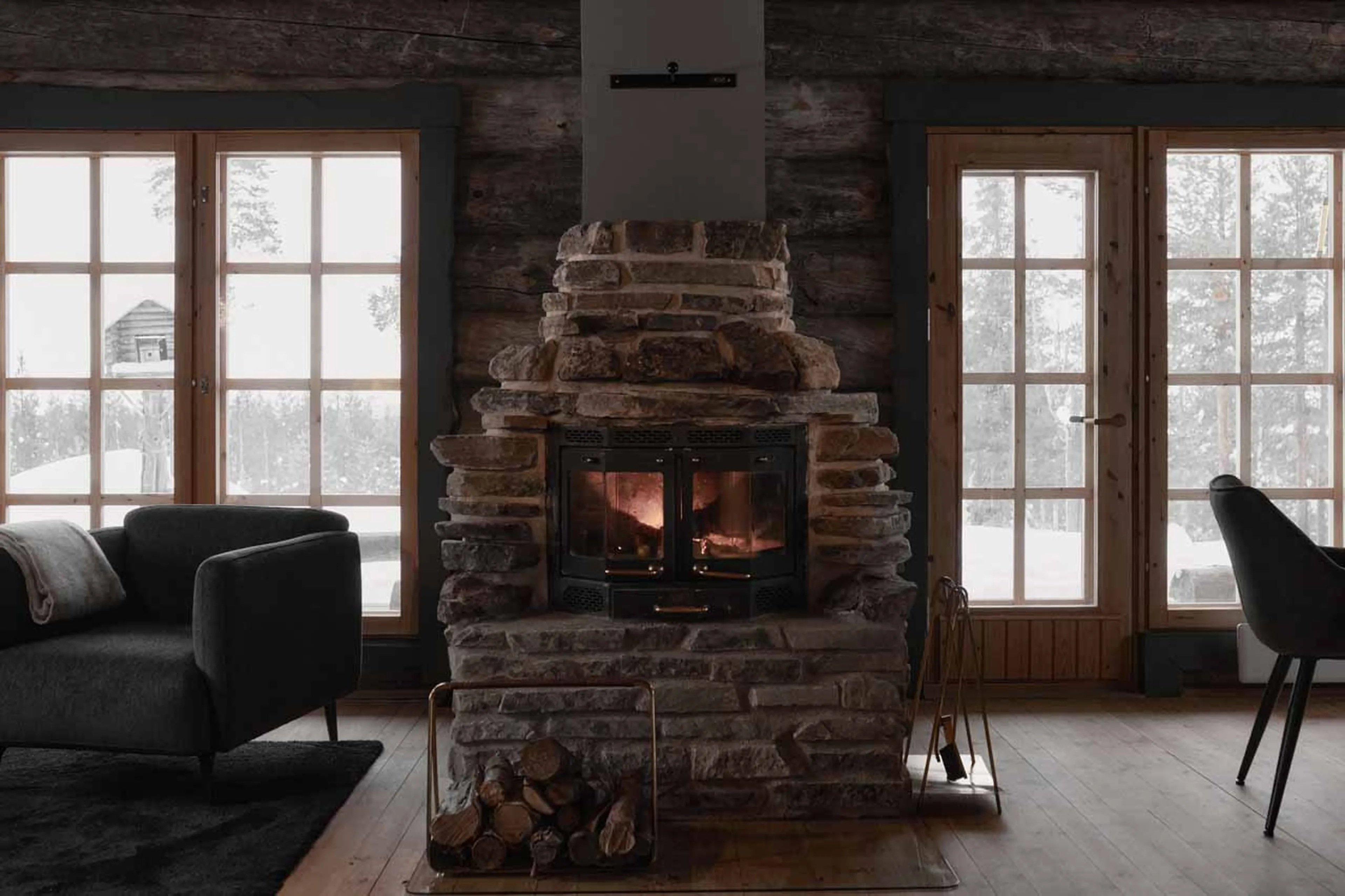 Stone fireplace in The Fell Lodge, Finland