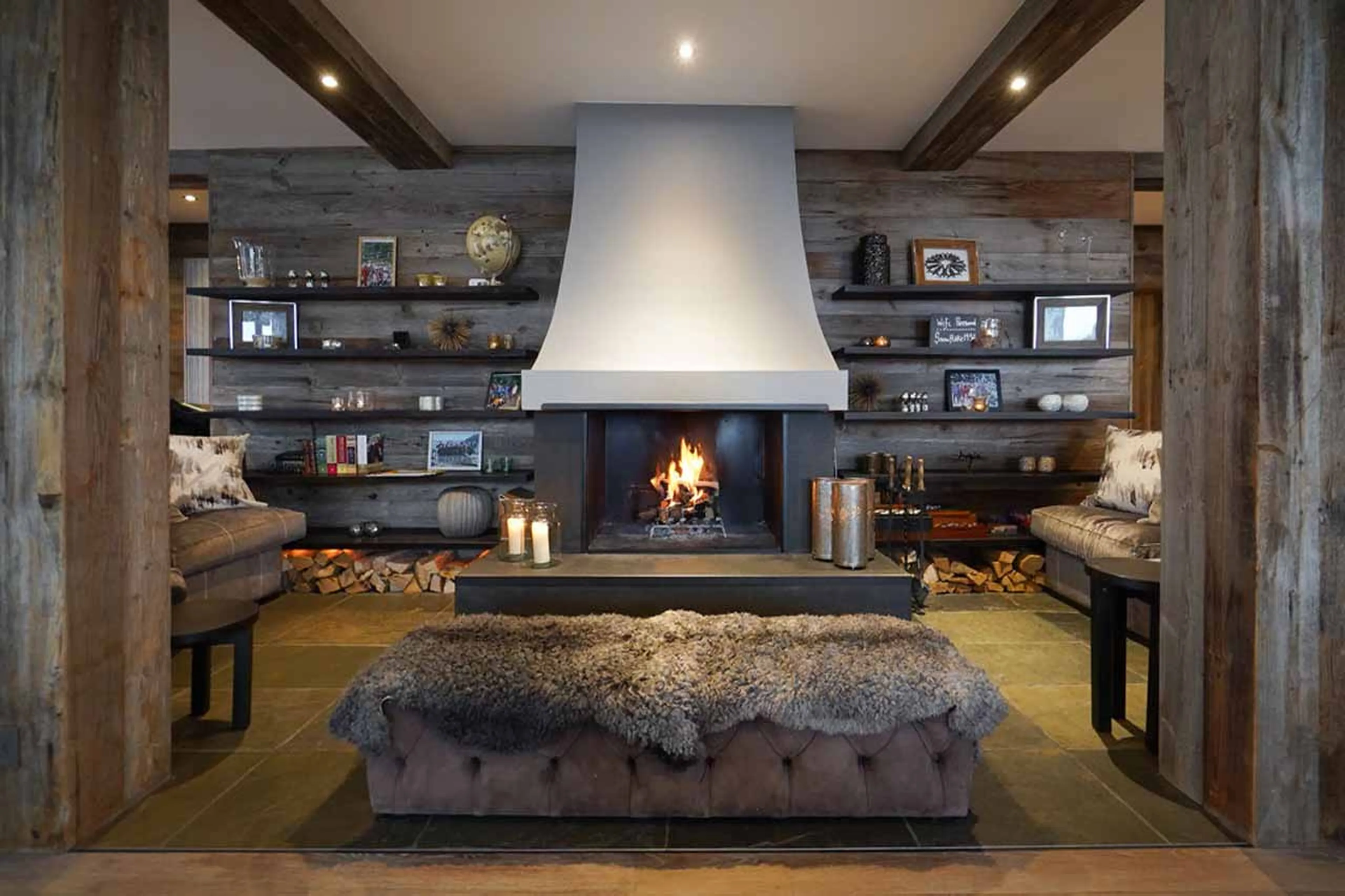 Fireplace in the living room of The Lodge in Verbier