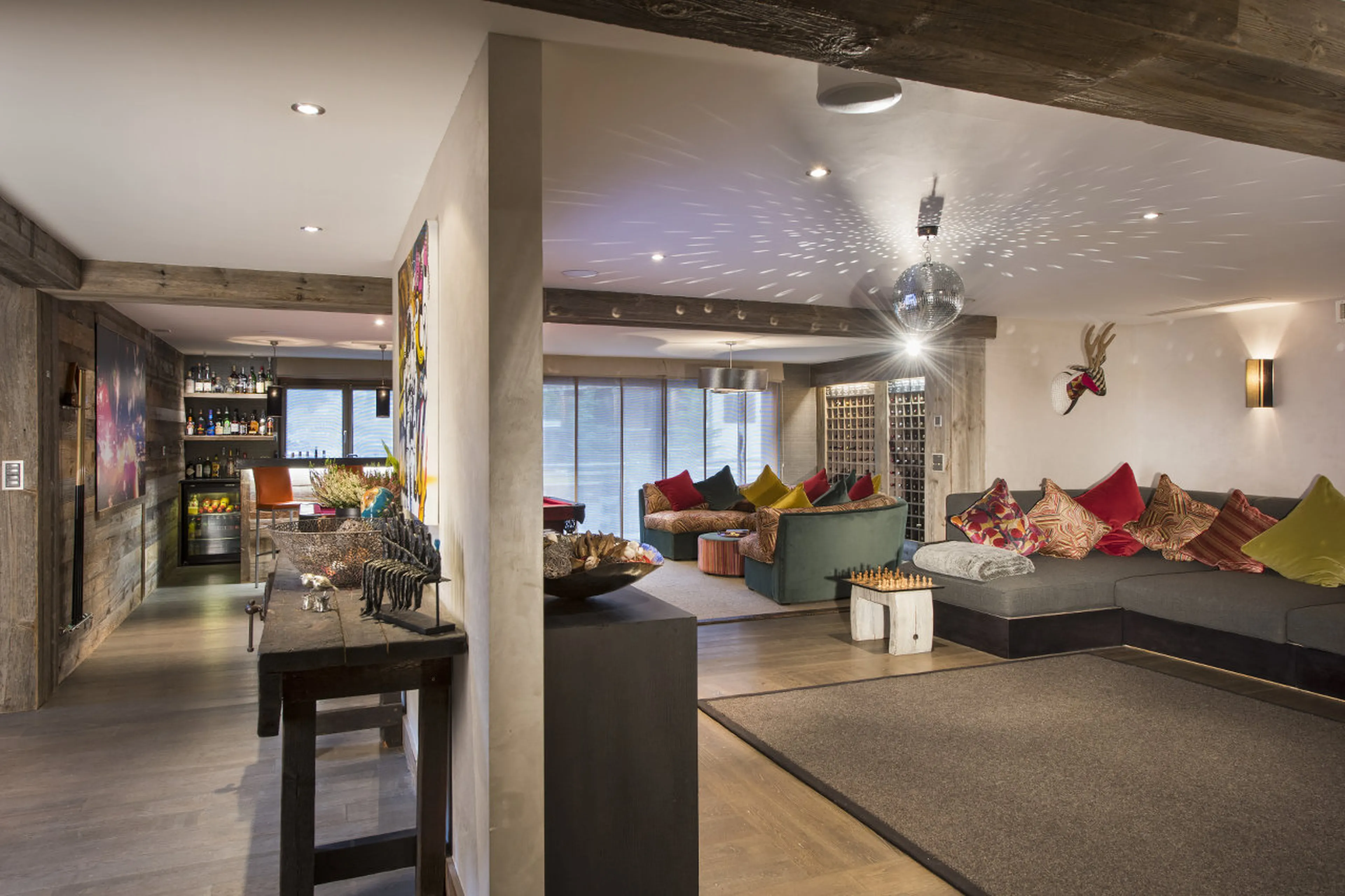 Seating areas in party room at he Lodge in Verbier