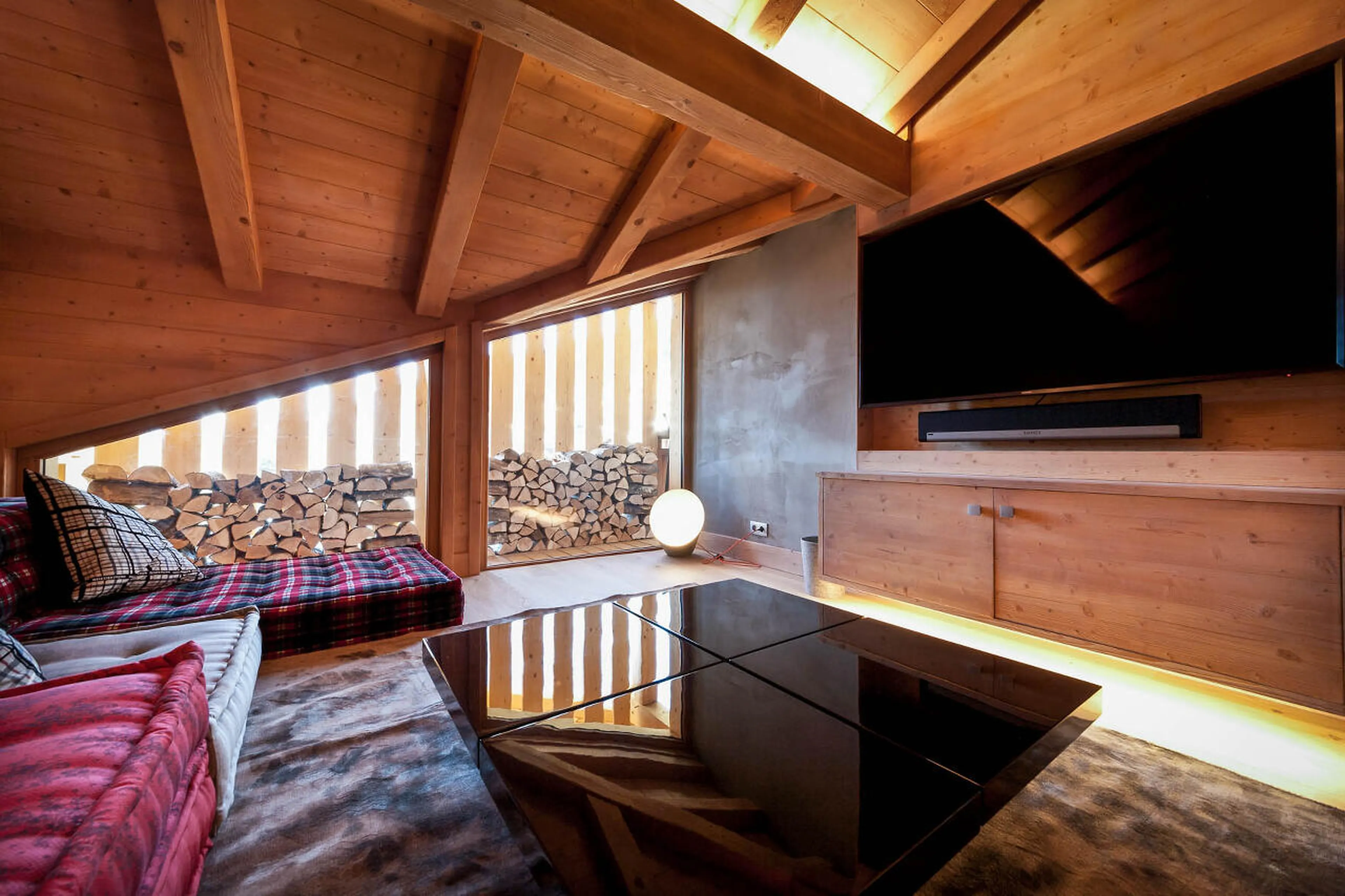 Separate TV room with comfortable seating in The Penthouse, Les Gets