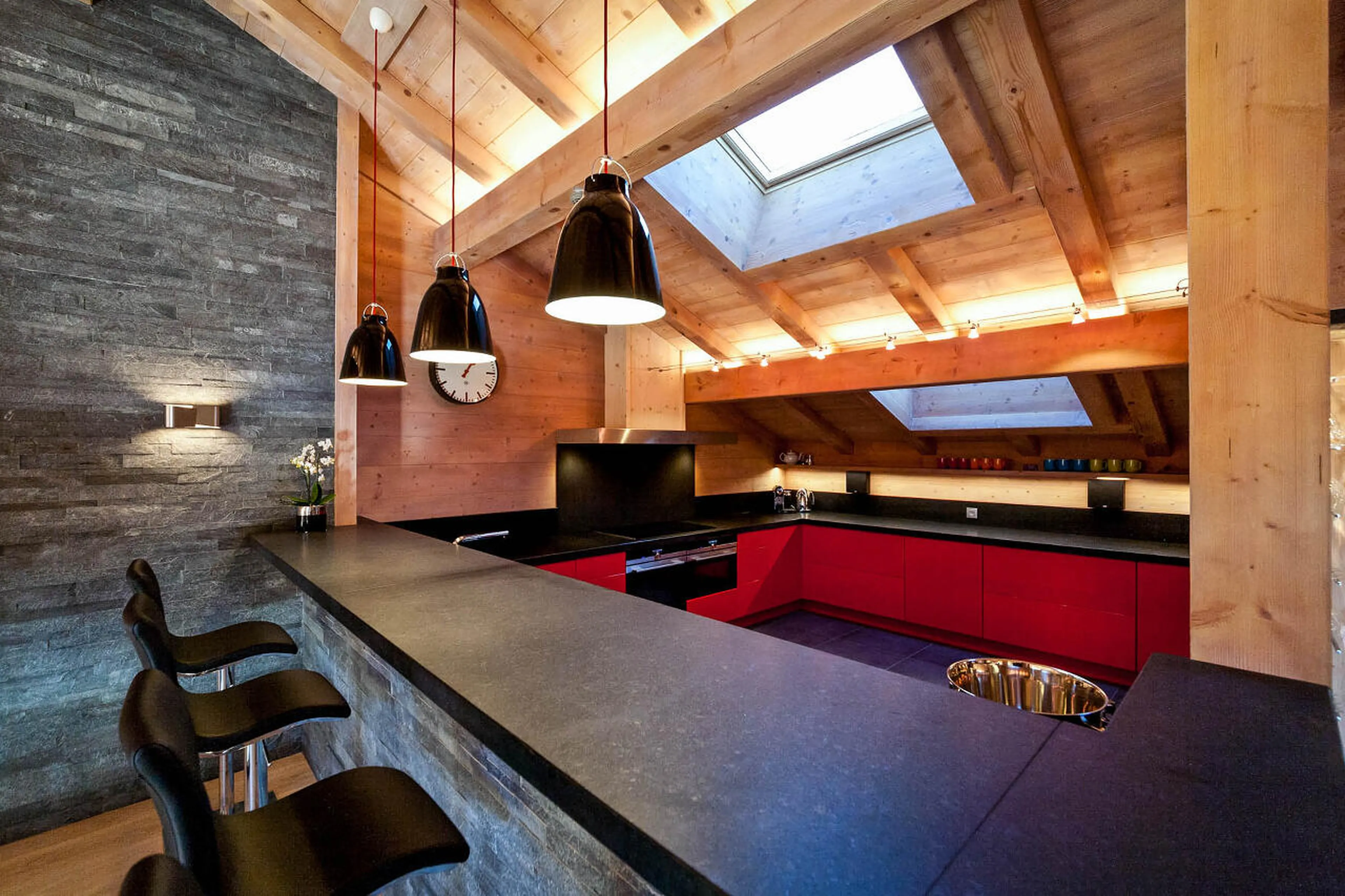 Equipped kitchen with breakfast bar in The Penthouse, Les Gets