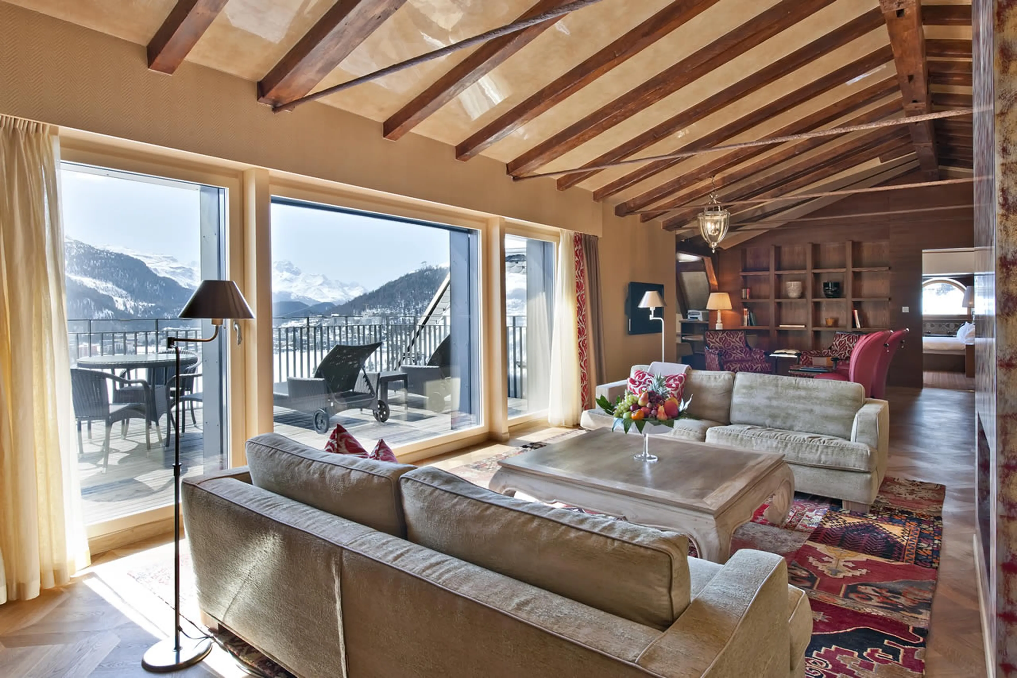 Access to balcony from living area of The Penthouse in St Moritz