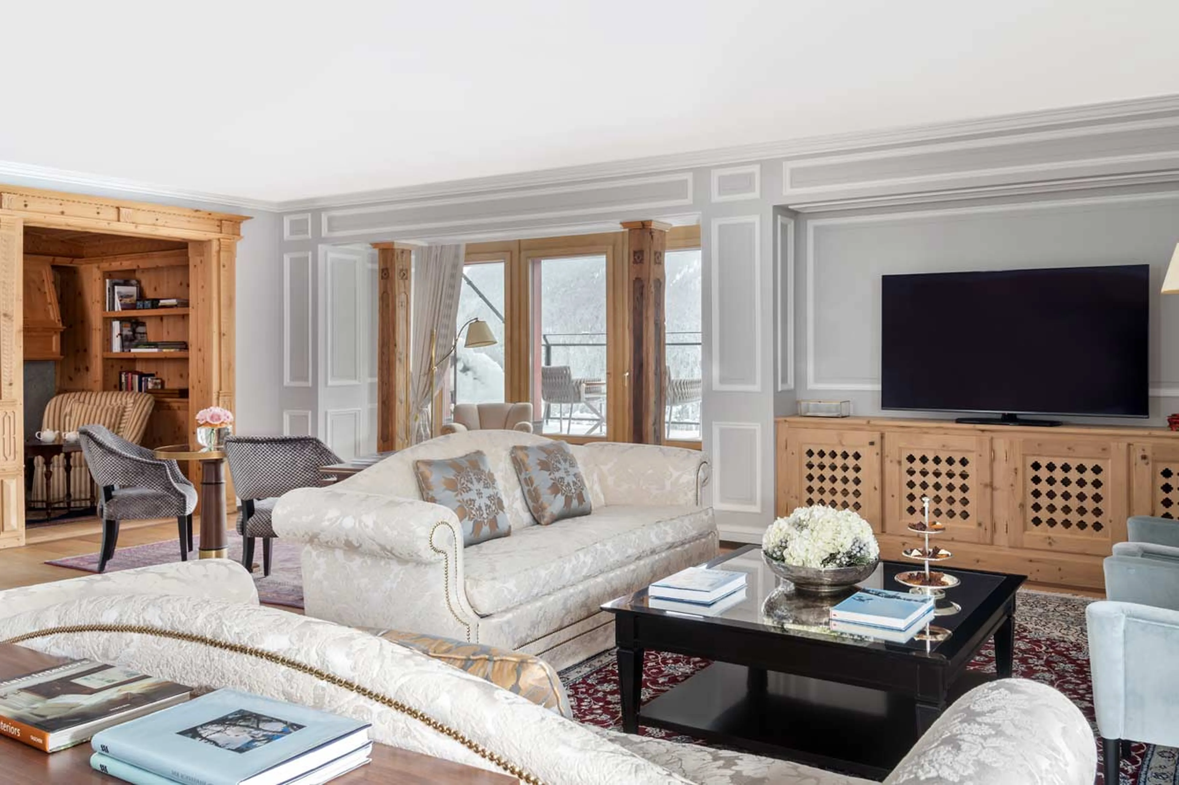 Living room with TV at The Tower Suite in St Moritz