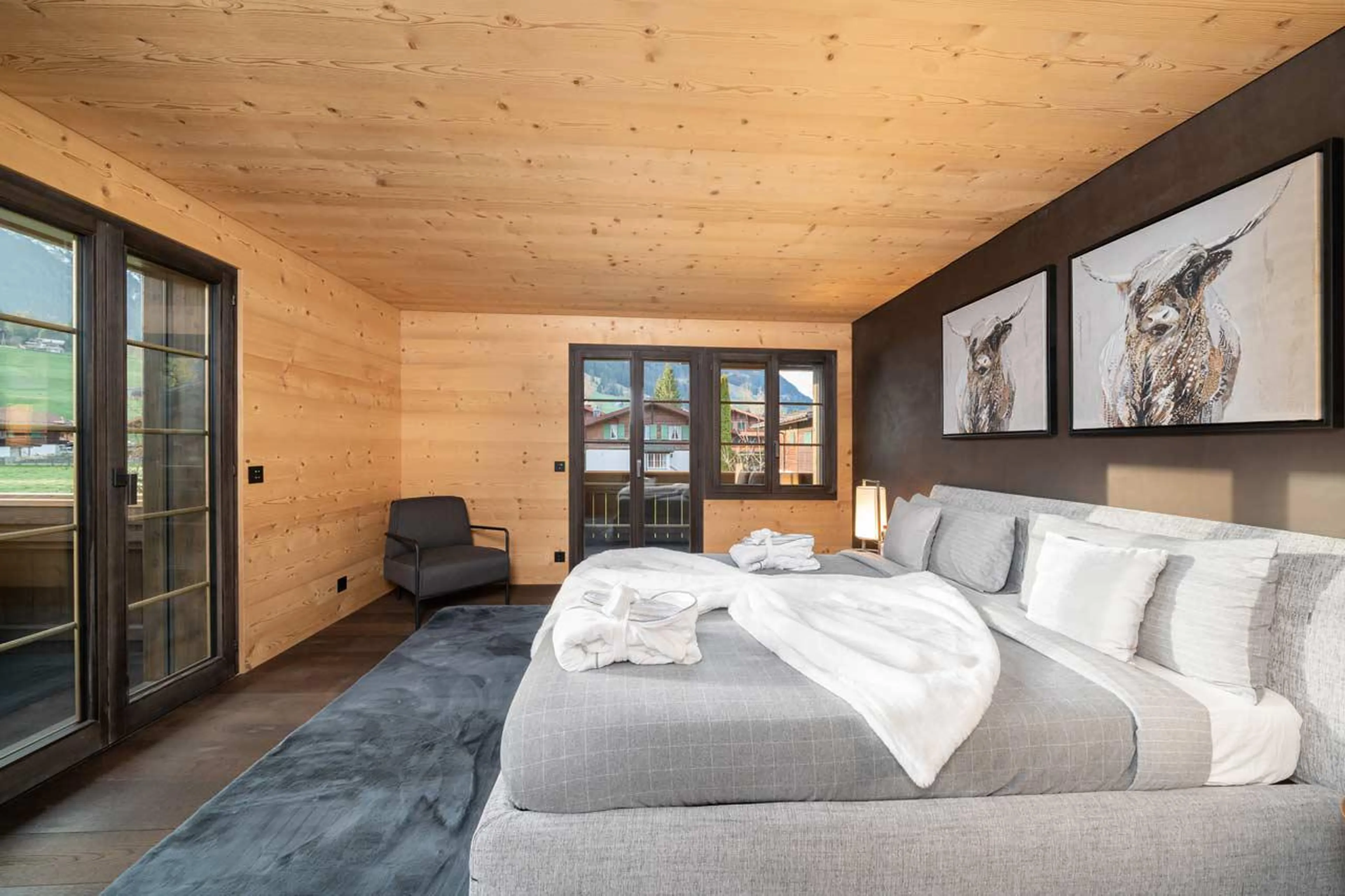 Double bedroom with dressing room at Apartment Eggli in Gstaad