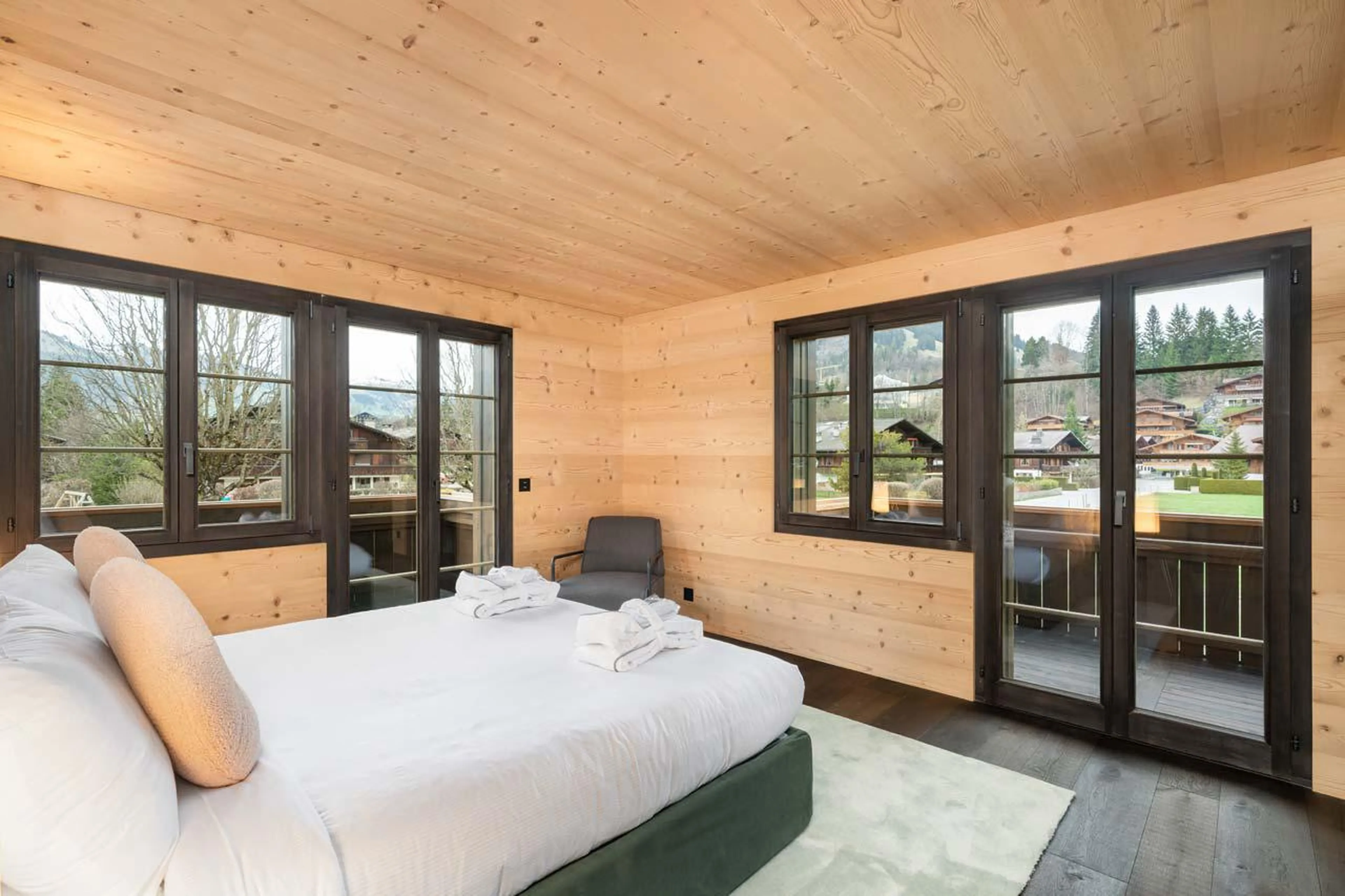 Spacious double bedroom at Apartment Eggli in Gstaad
