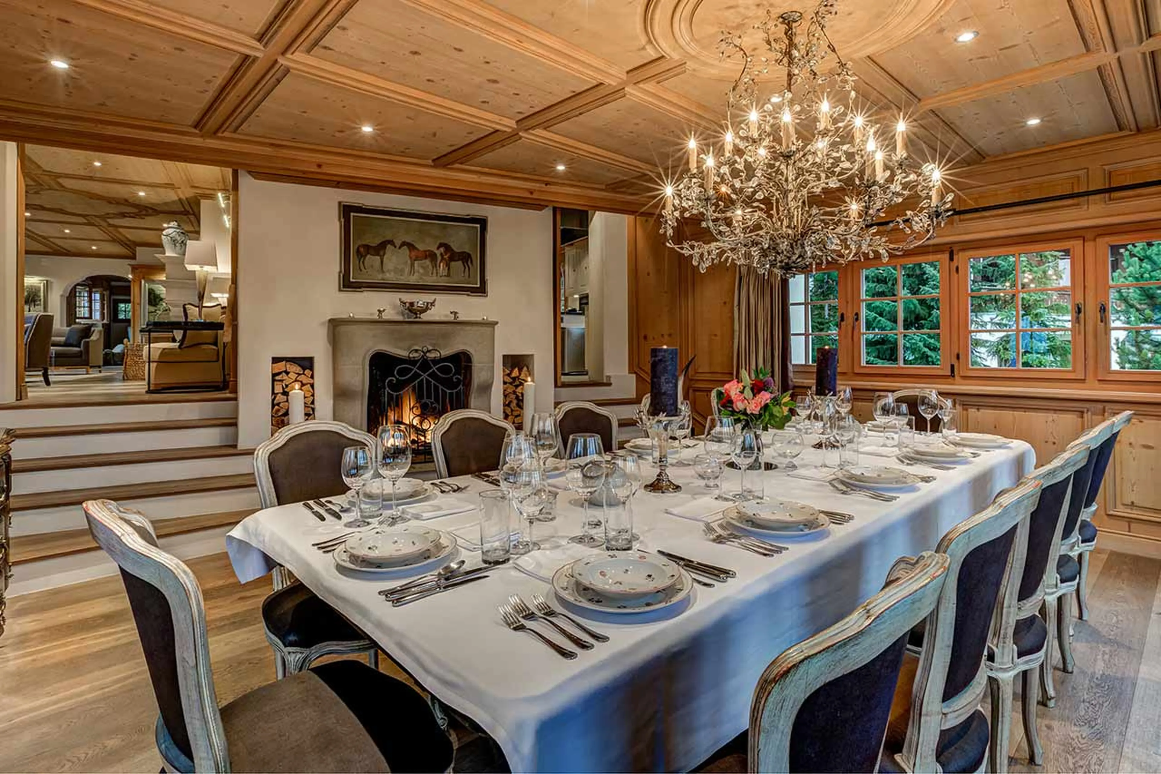 Dining room with fireplace at  Tivoli Lodge in Davos