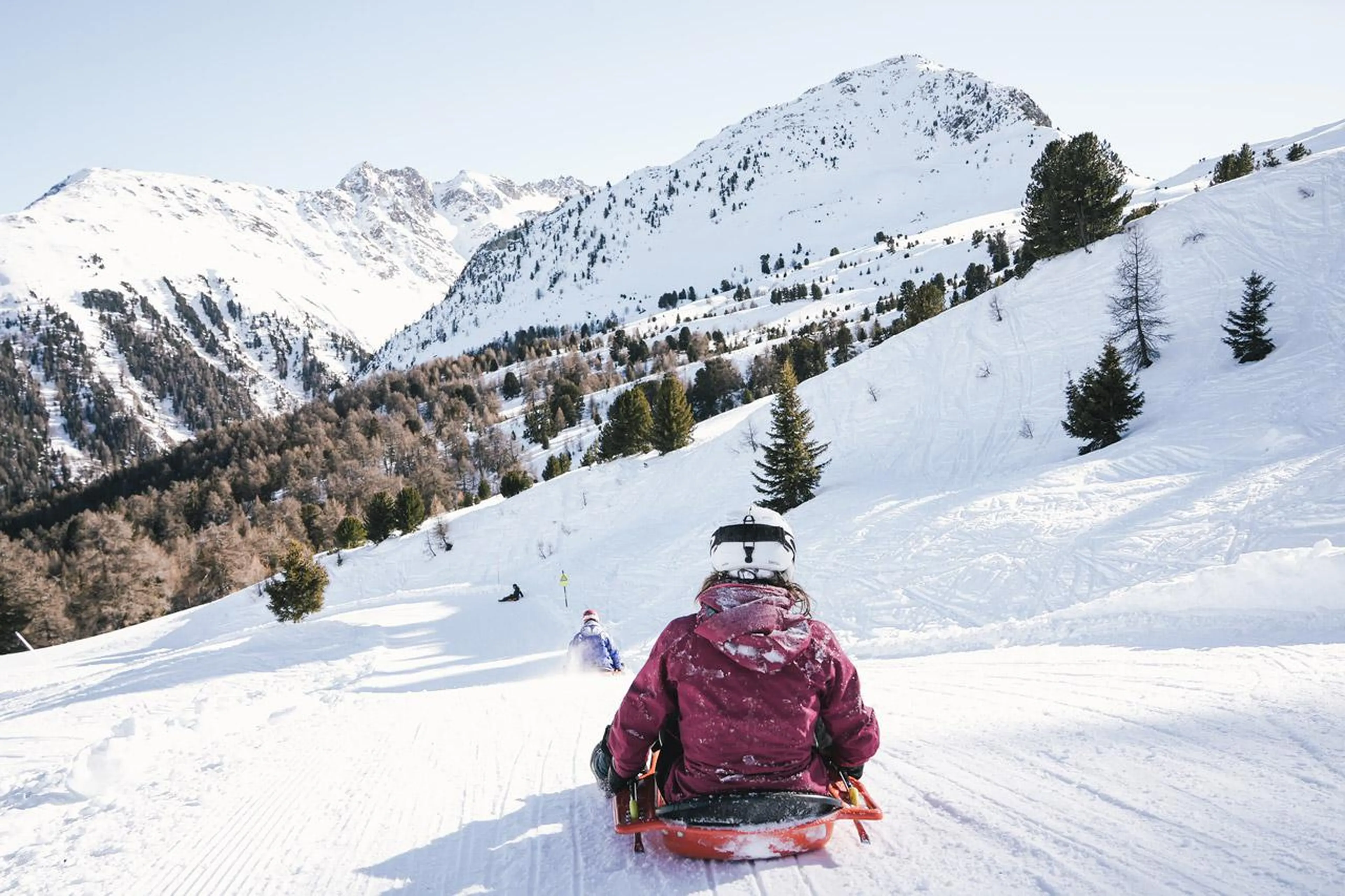 Tobogganing down the slopes in verbier
