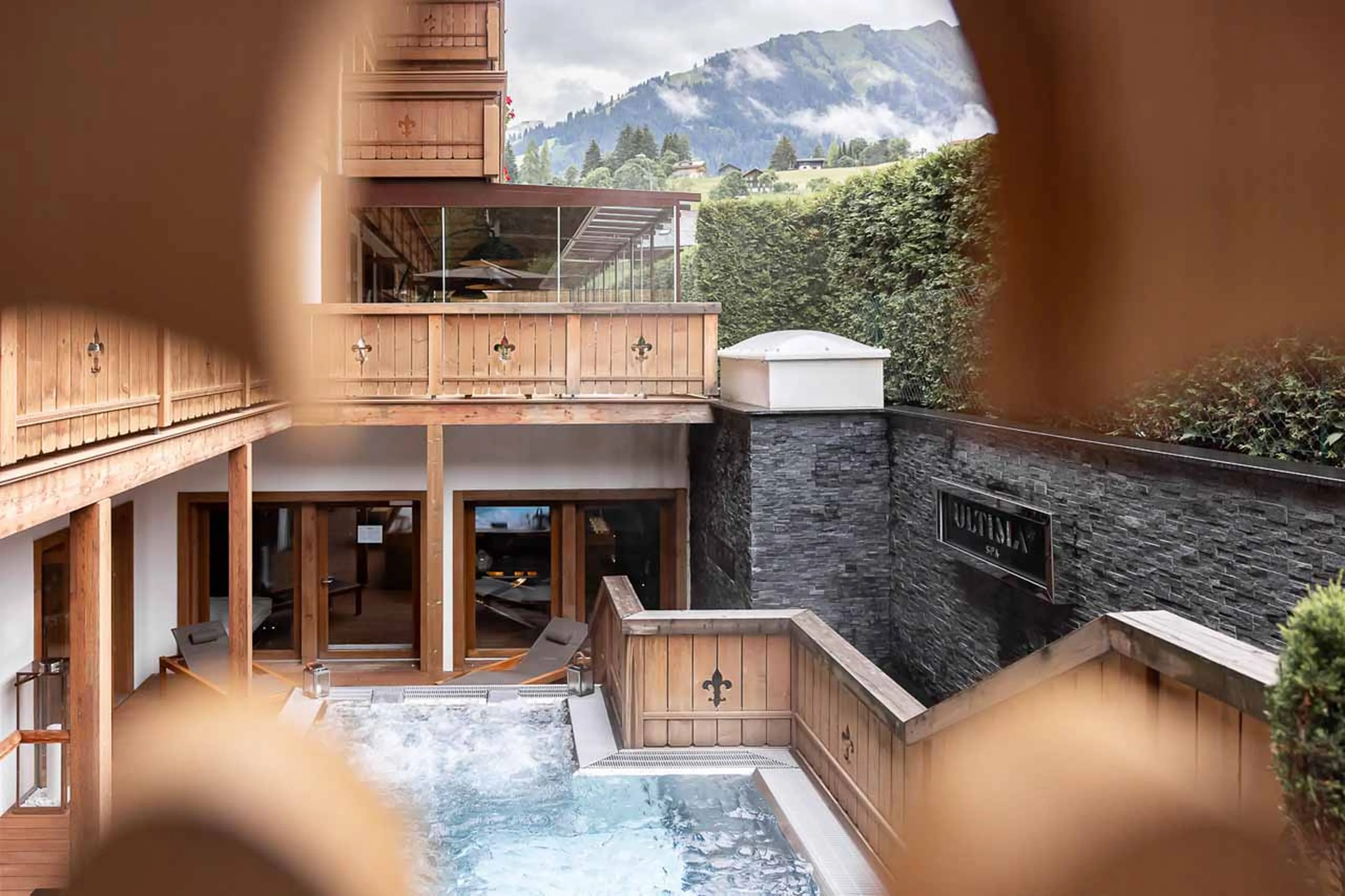 Jacuzzi in summer at Ultima Gstaad 4BR Residence in Gstaad