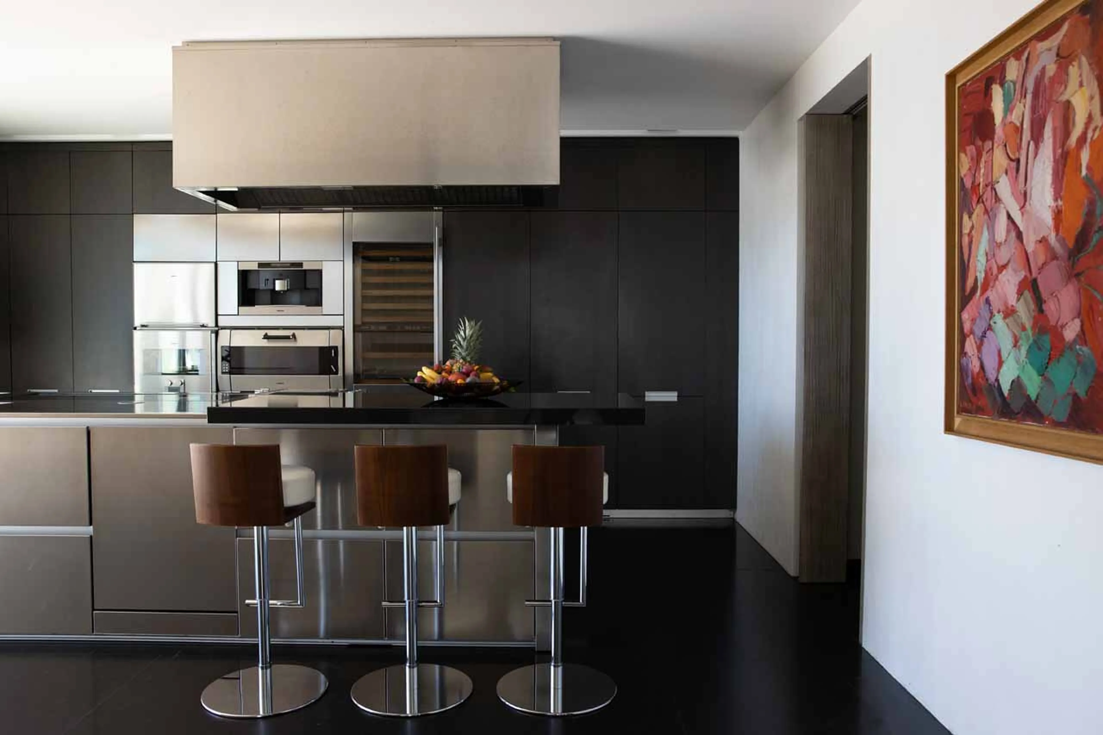 Kitchen with breakfast bar at Villa du Lac in Geneva