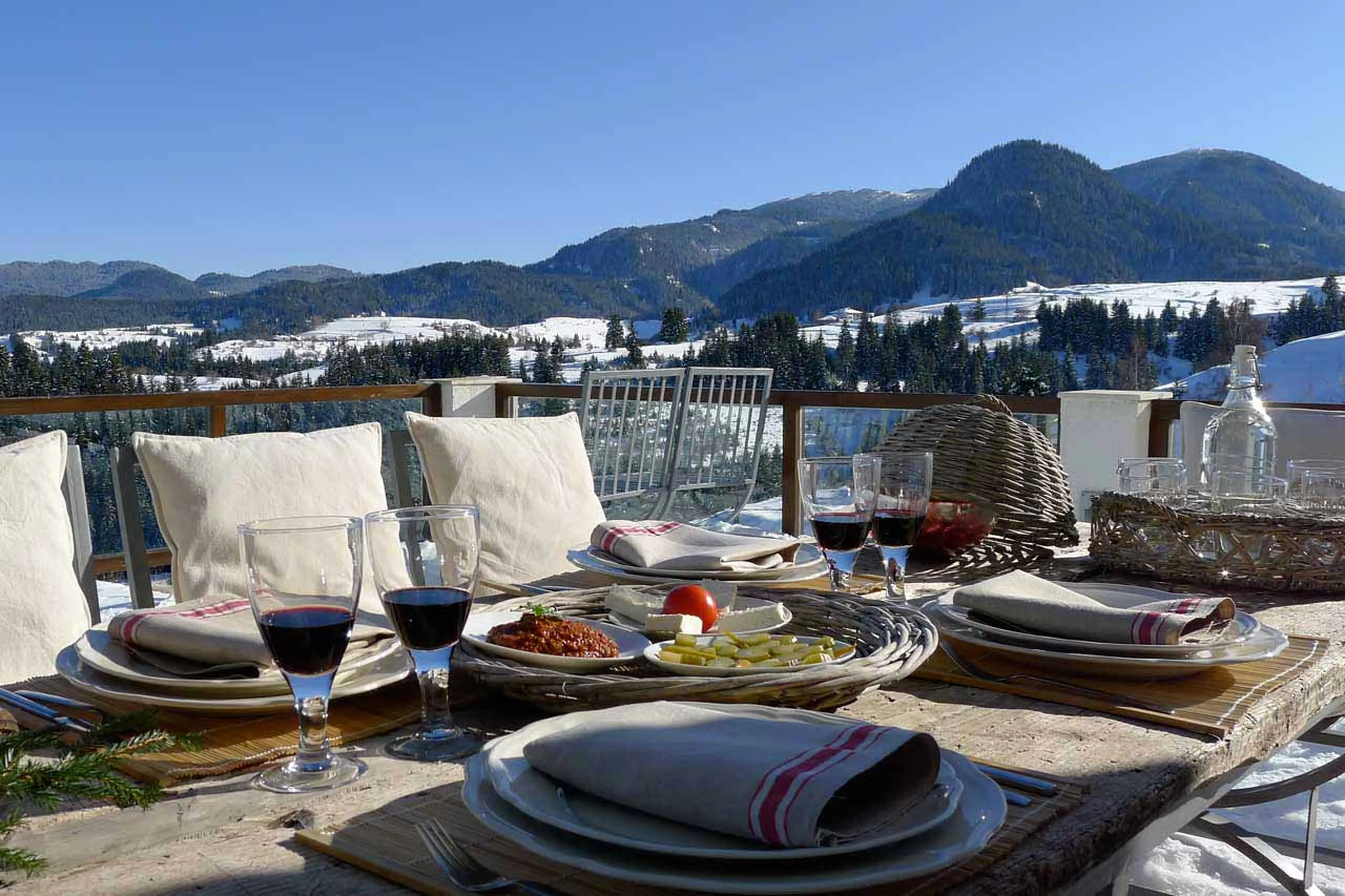 Al fresco dining on terrace at Villa Gella in the Rhodope Mountains