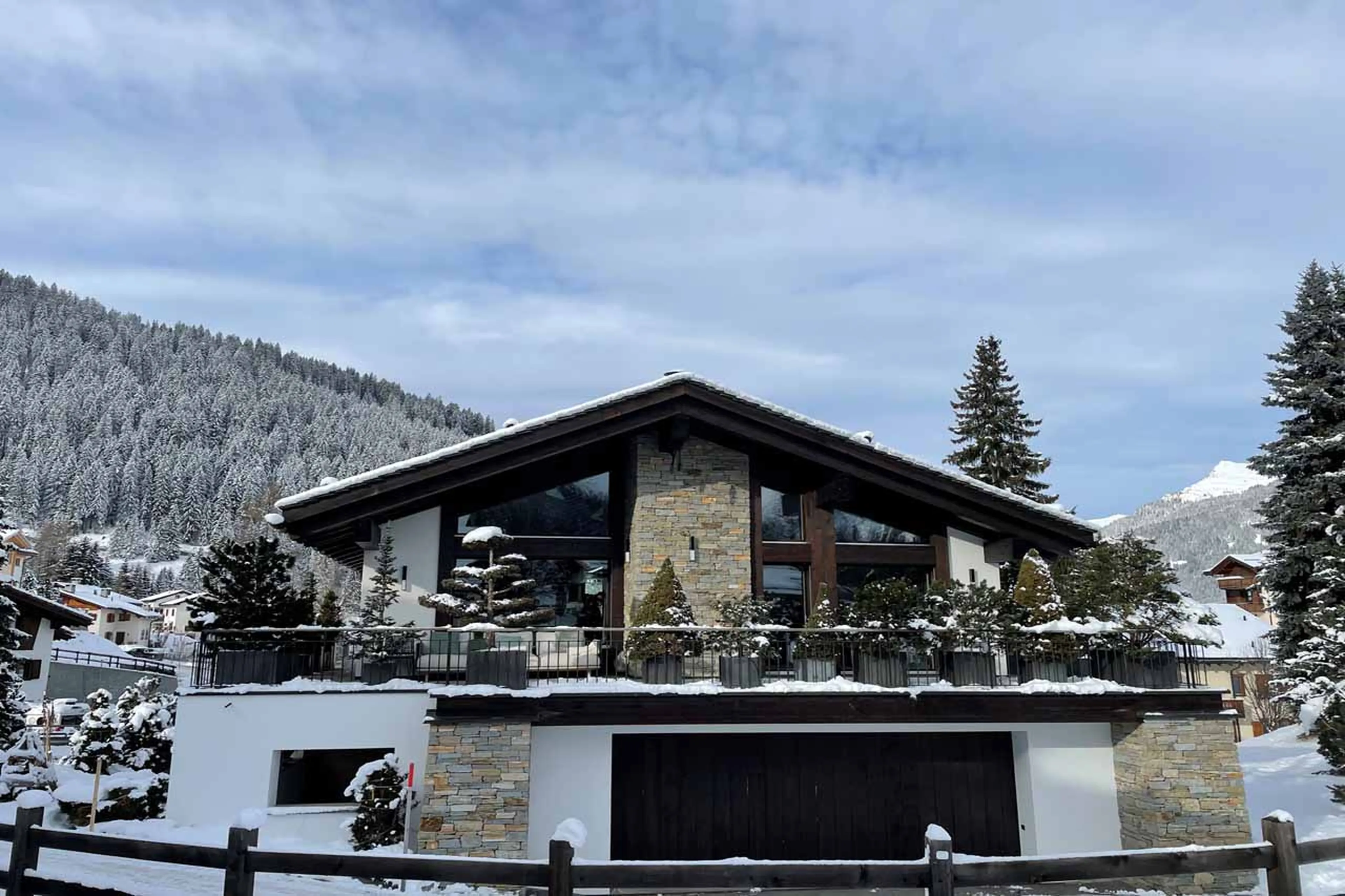 Exterior and terrace at Villa Grialetsch in winter in Klosters