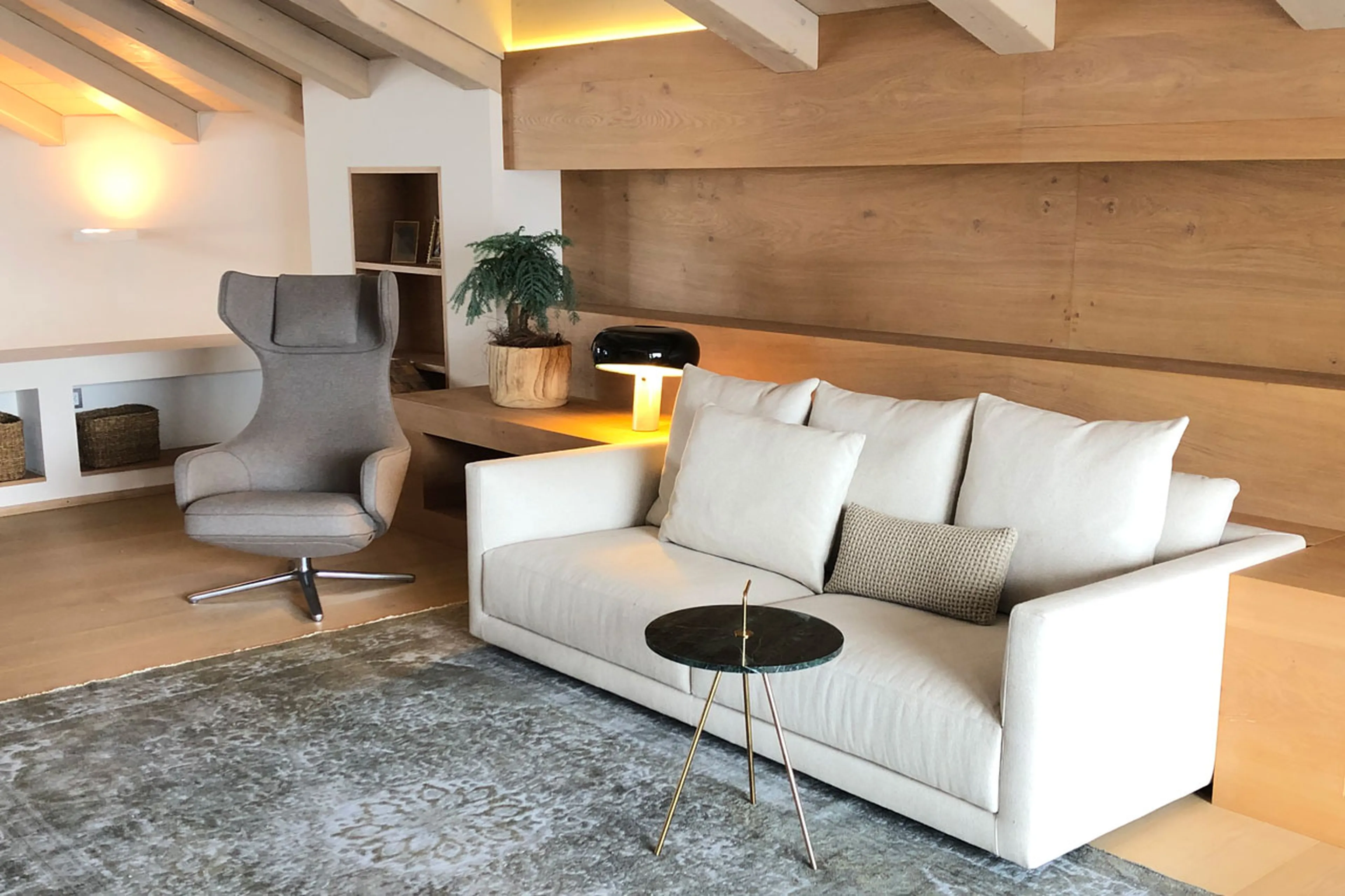 Sofas in library of Villa Grialetsch in Klosters
