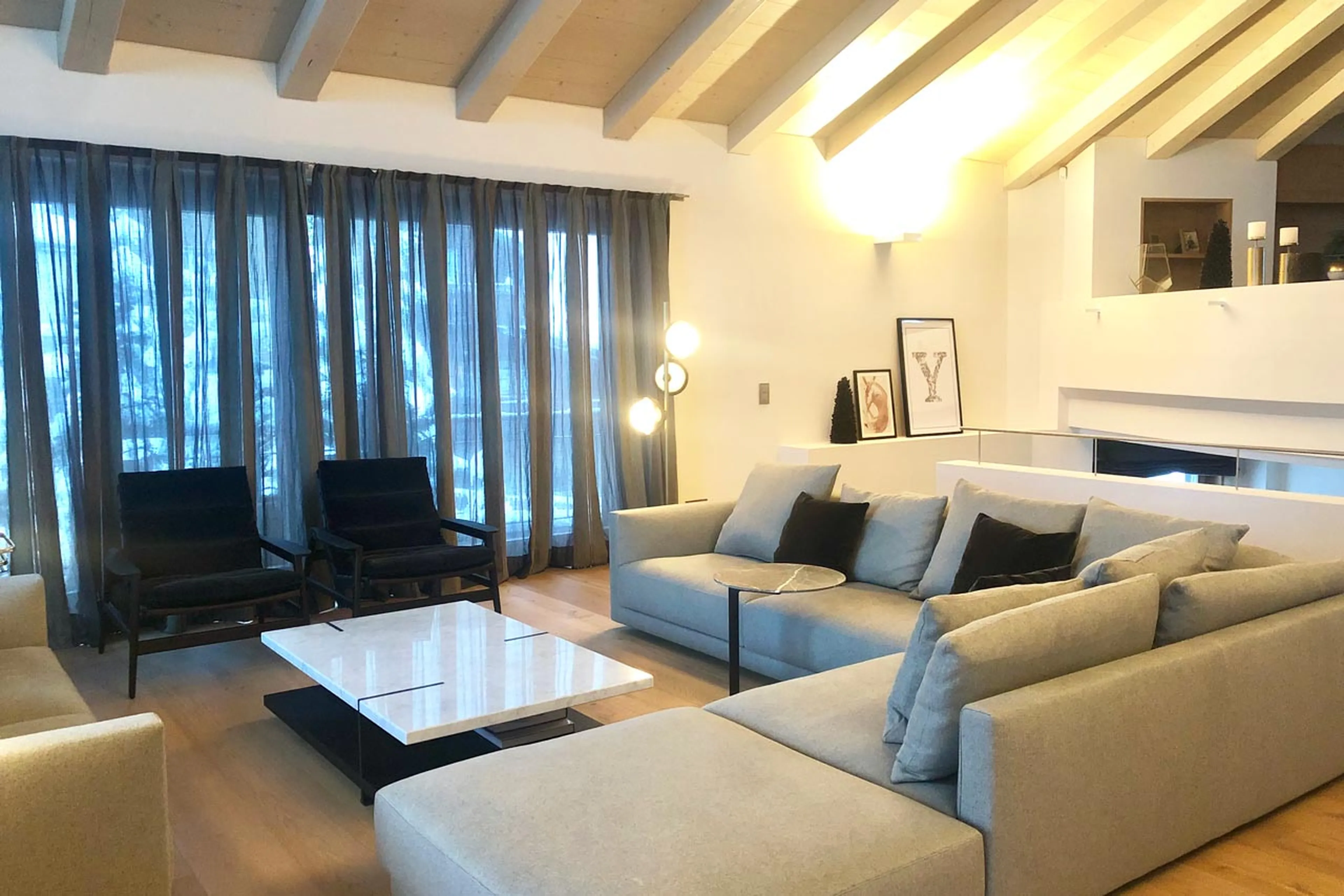 Open plan living & dining area at Villa Grialetsch in Klosters