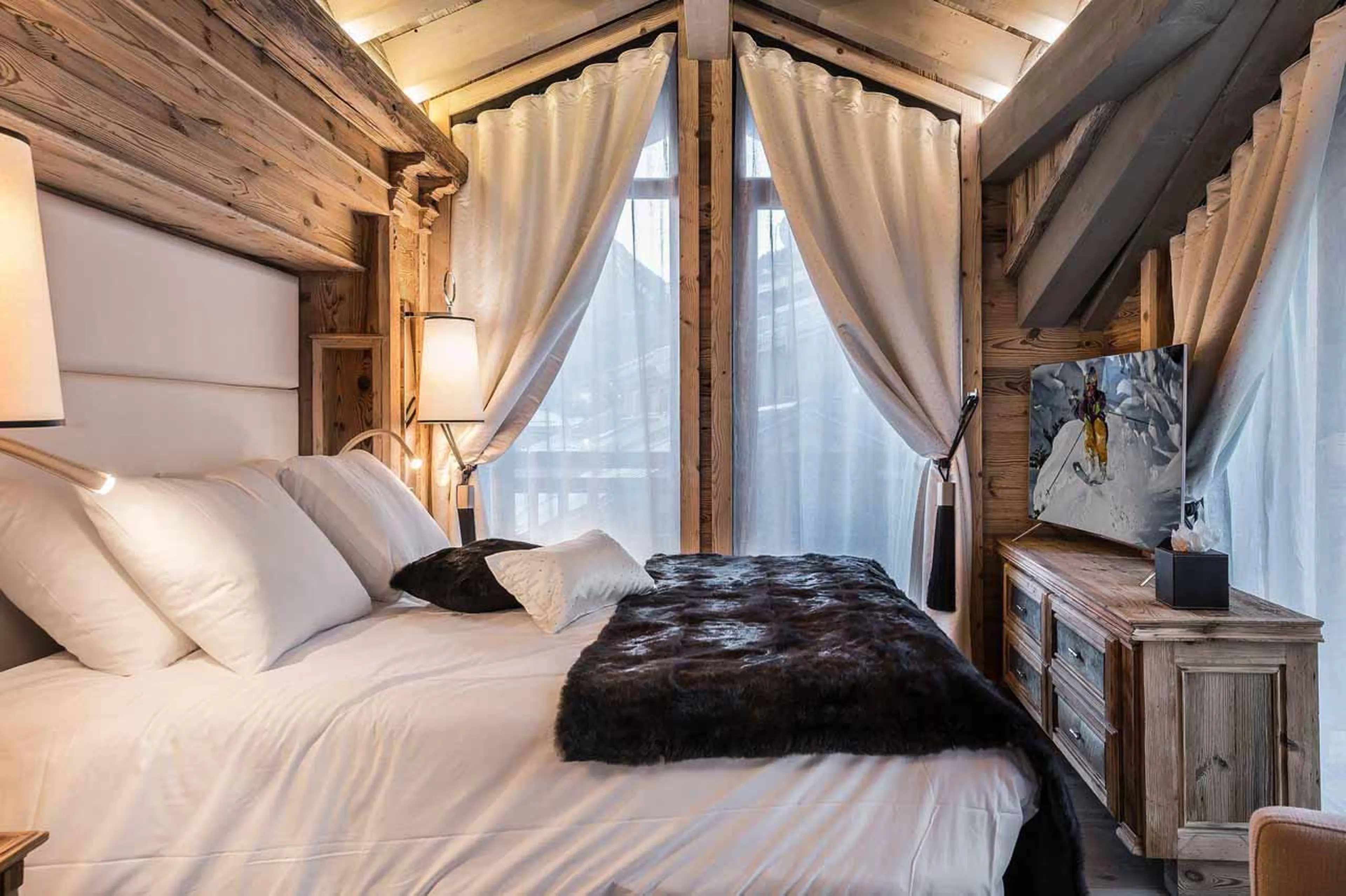 Bedroom one at White Chalet in Courchevel Le Praz