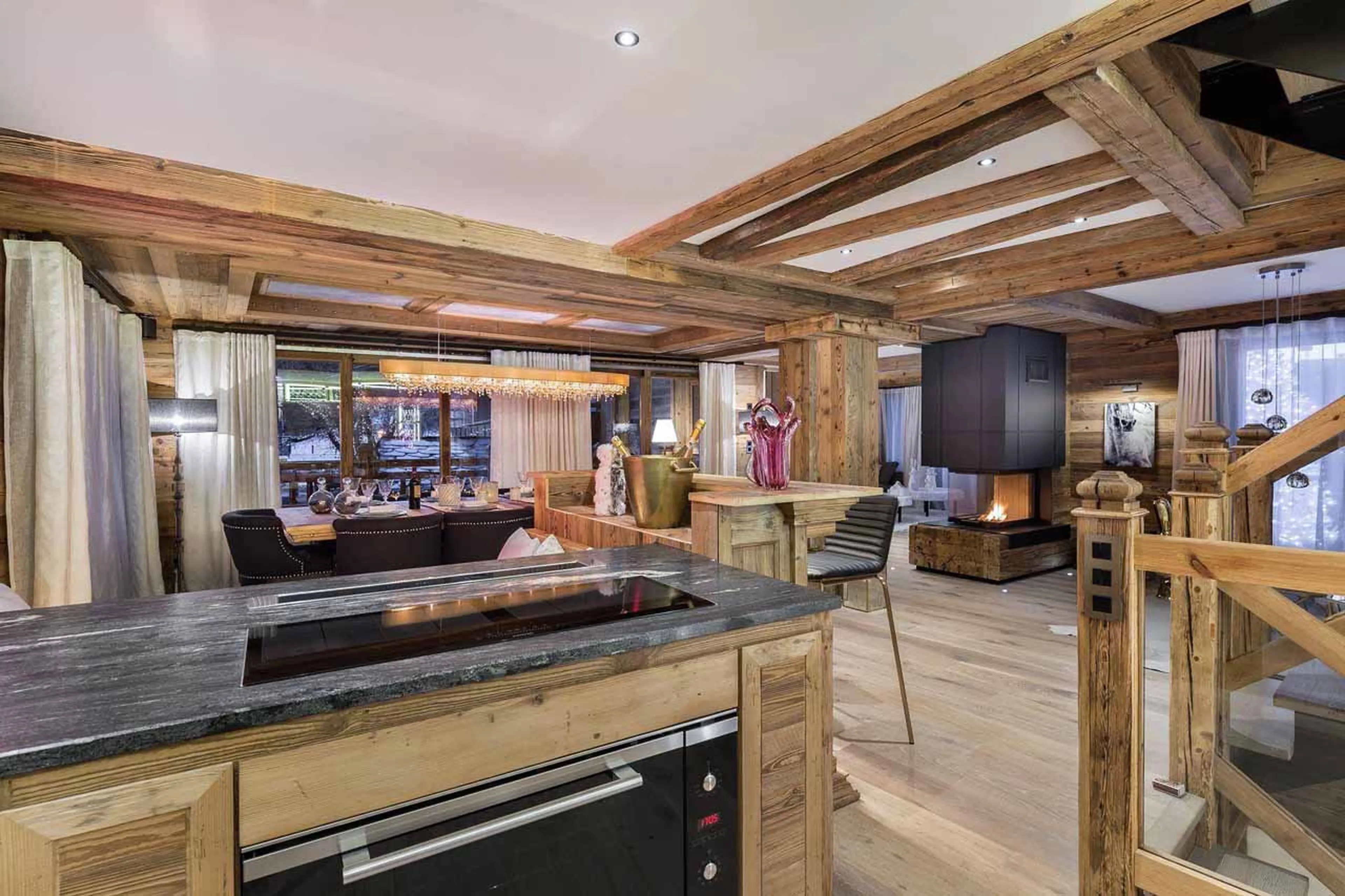 Kitchen with breakfast bar at White Chalet in Courchevel Le Praz
